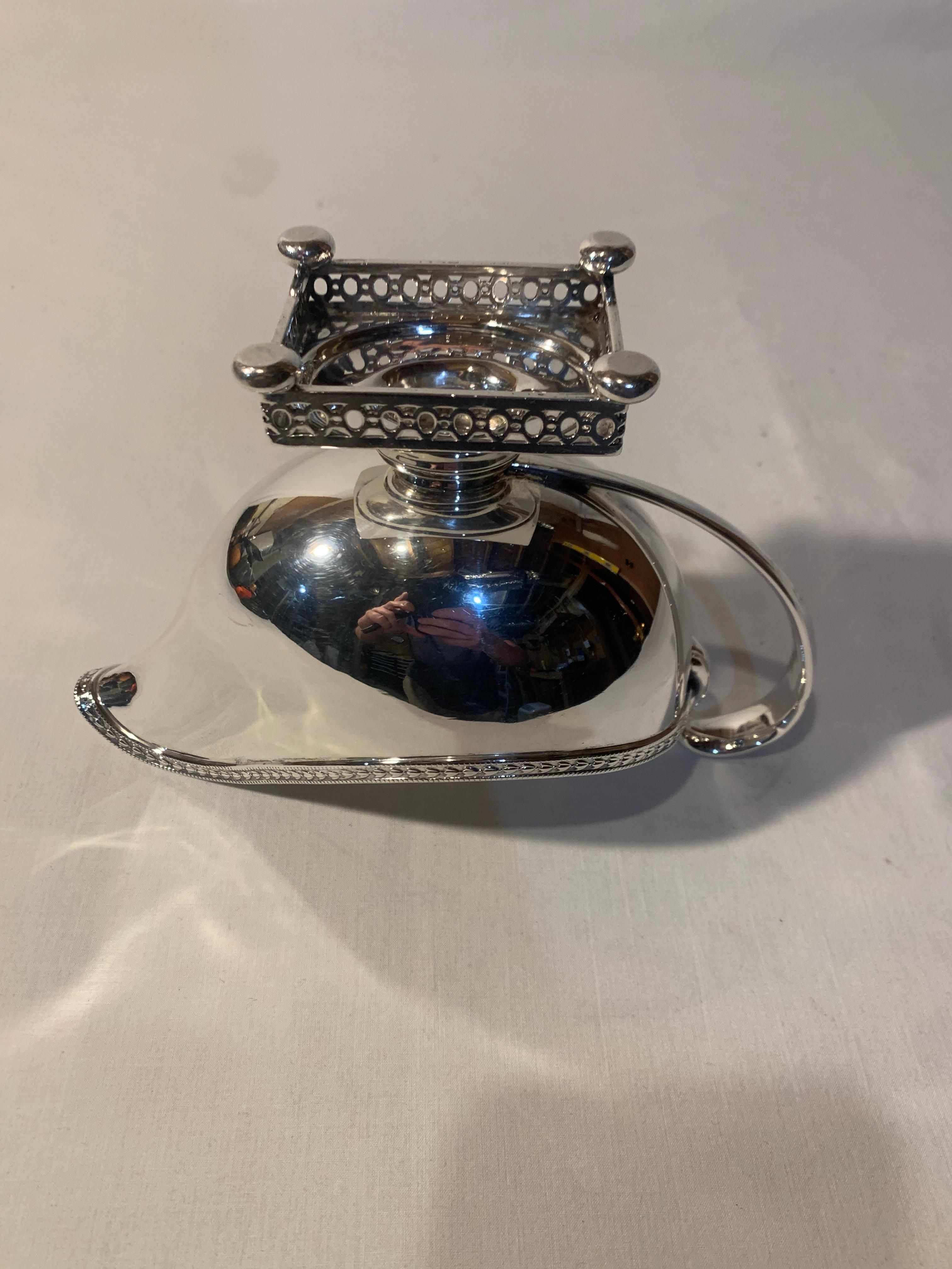 This is a beautiful and unique Gorham Sterling Silver Gravy boat is in pristine condition. It stands 5 inches in height, is 8 inches long and is 3.5 inches in width. The Hallmarks on the bottom indicate its from 1894. 10 troy ounces.
