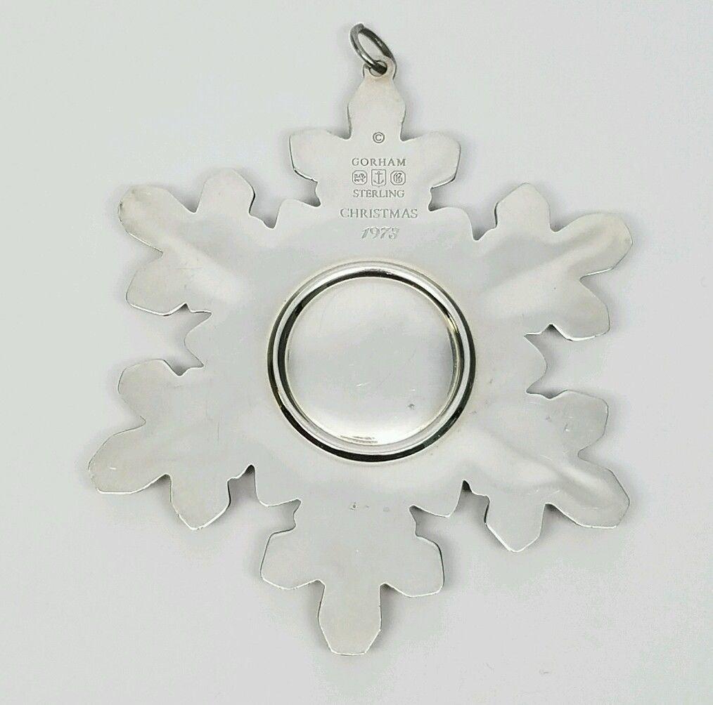 One Gorham sterling silver snowflake ornament from 1973. Measures approx 3.5