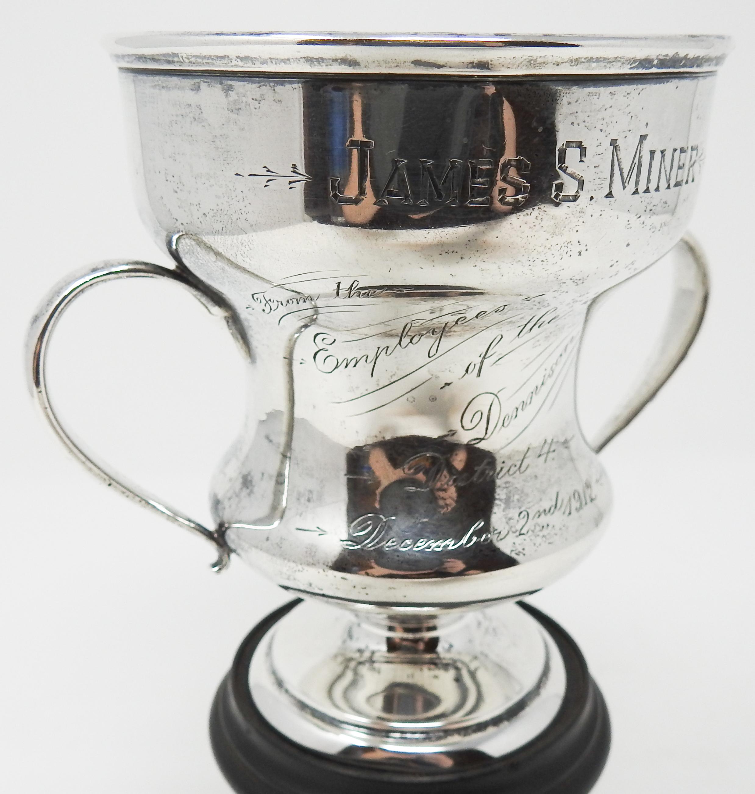 Offering this gorgeous Gorham sterling silver trophy. The trophy is engraved with James S Miner, Employee of the Dennison, District 4, December 2, 1912.
