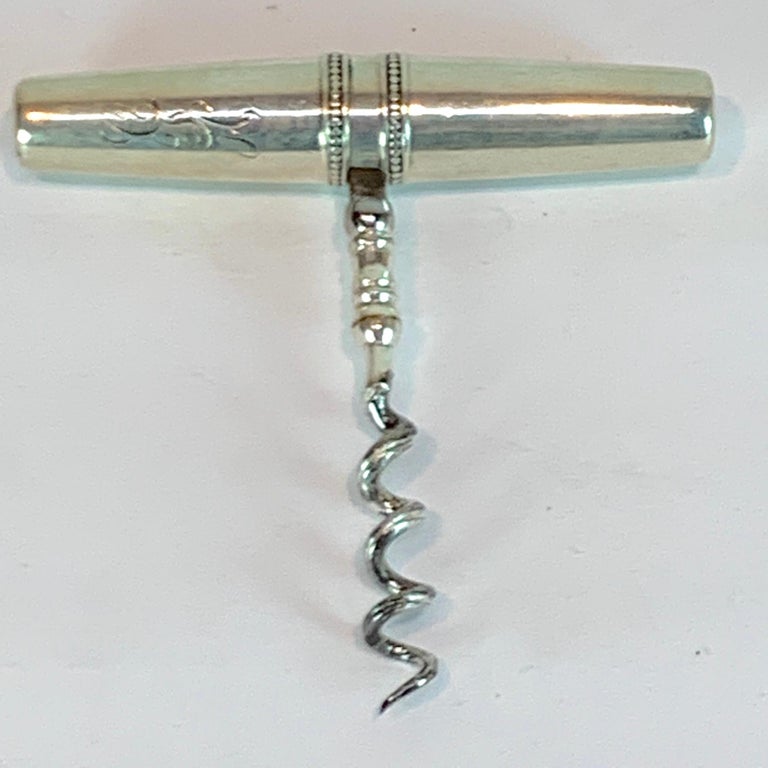 Gorham sterling travel corkscrew, works effectively, the corkscrew smoothly pulls out of the sterling cartridge, which becomes the handle. Marked 'Gorham Sterling and other metals, B2061', Script Monogram
Cartridge measures: 3.25
