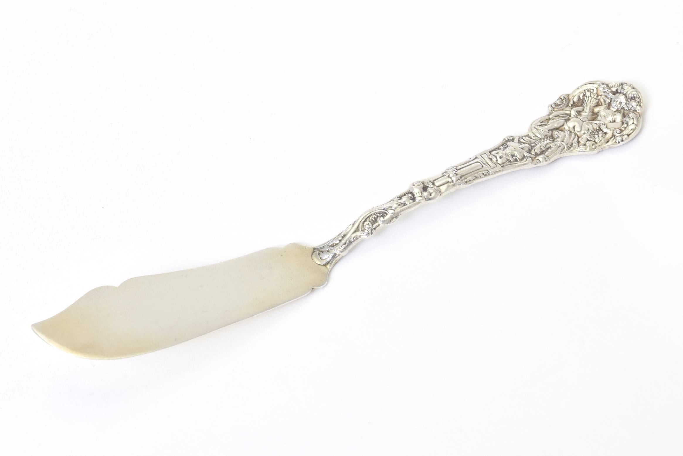 Versailles (Sterling, 1888, No Monograms) by Gorham Silver.
This is an antique Gorham sterling silver master butter knife in the 1888 Versailles pattern. This beautiful art nouveau all sterling knife has a smooth blade and ornate designs on the