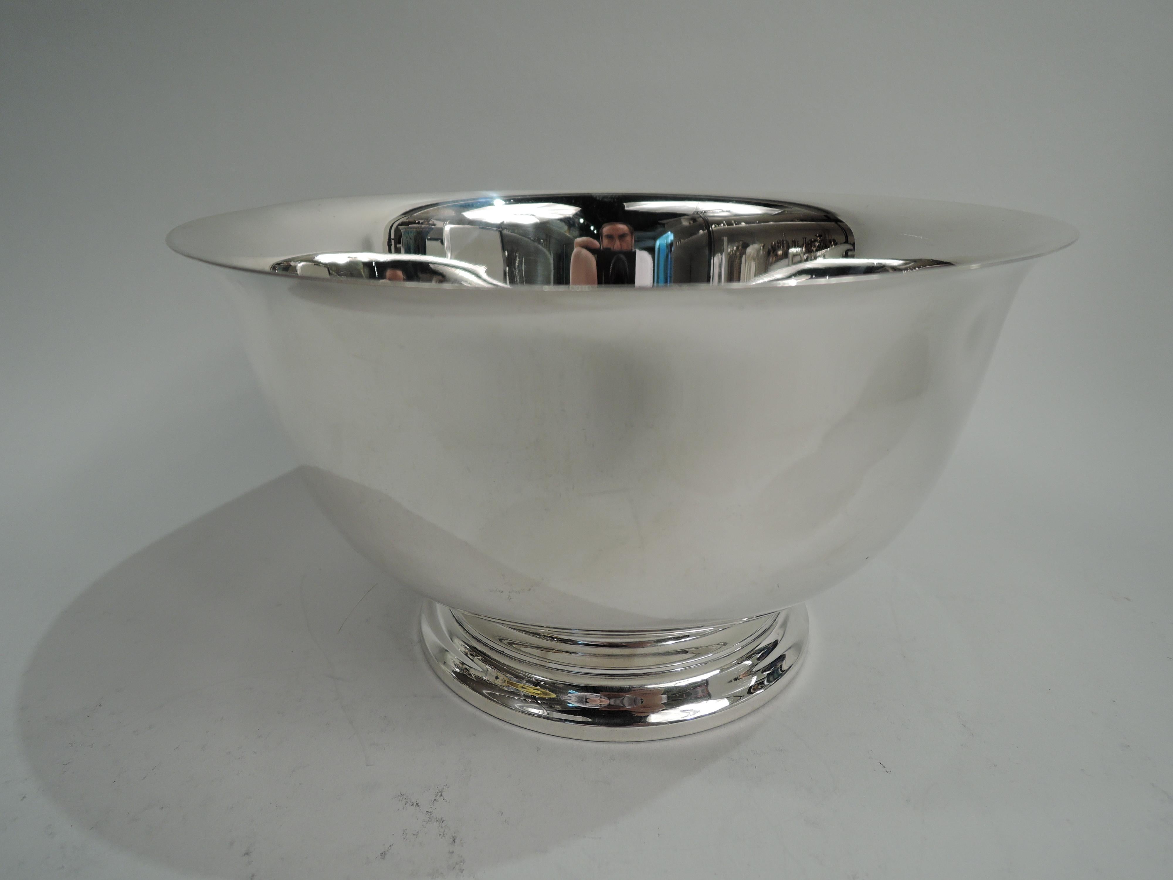 Traditional sterling silver Revere bowl. Made by Gorham in Providence in 1957. Curved sides, flared rim, and stepped foot. A historic form that can suit many modern uses. Fully marked including maker’s stamp, date code, no. 41659, and phrase “P.