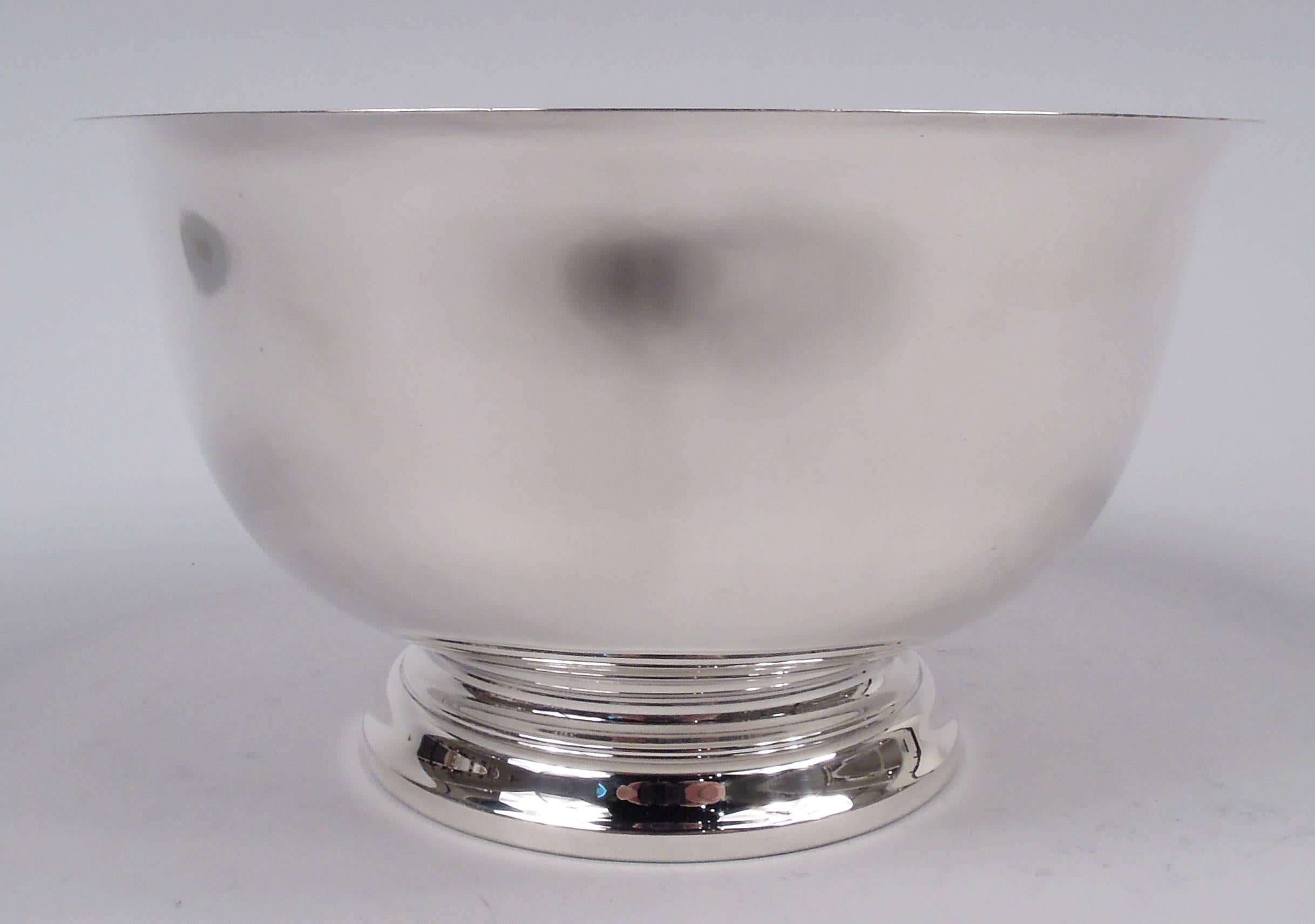 Traditional sterling silver Revere bowl. Made by Gorham in Providence in 1945. Curved sides, flared rim, and stepped foot. A historic form that can suit many modern uses. Fully marked including maker’s stamp, date code, no. 41659, and phrase “P.