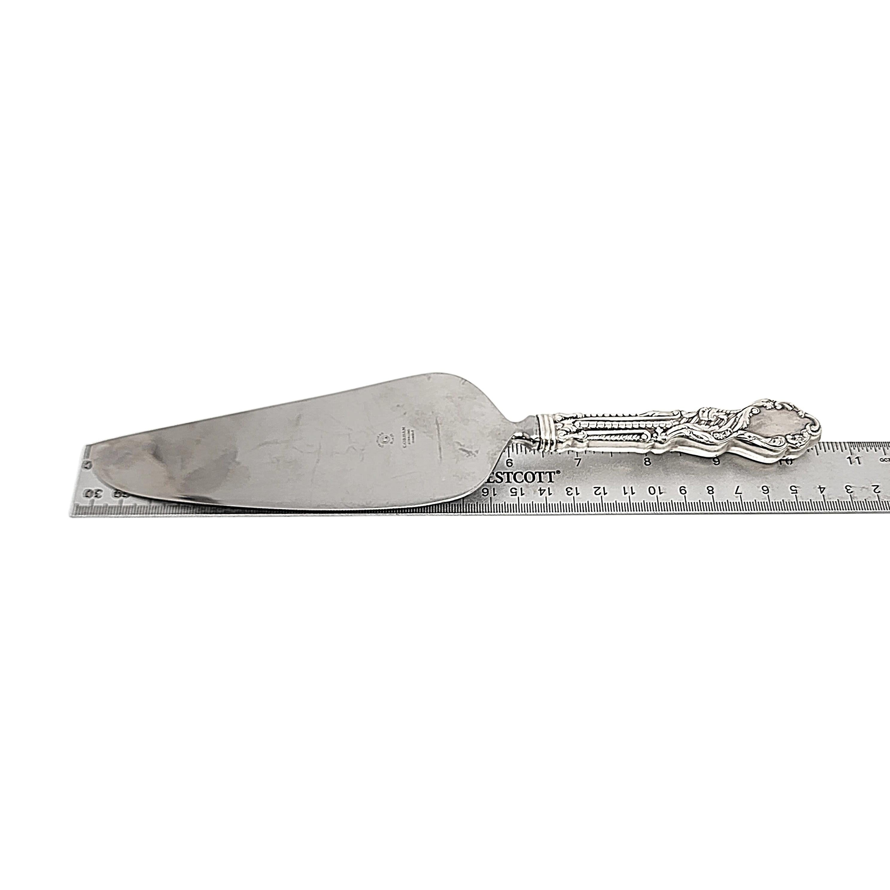 Sterling silver handle with stainless blade pie server by Gorham in the Versailles pattern.

No monogram

Gorham's Versailles is a multi motif pattern designed by Antoine Heller in 1885. Named for the Palace of Versailles, the pattern depicts ornate