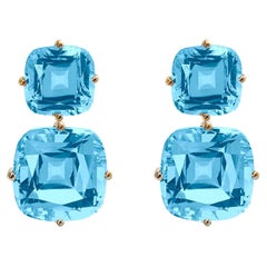 Goshwara Boucles d'oreilles à 2 niveaux en forme de coussin en topaze bleue