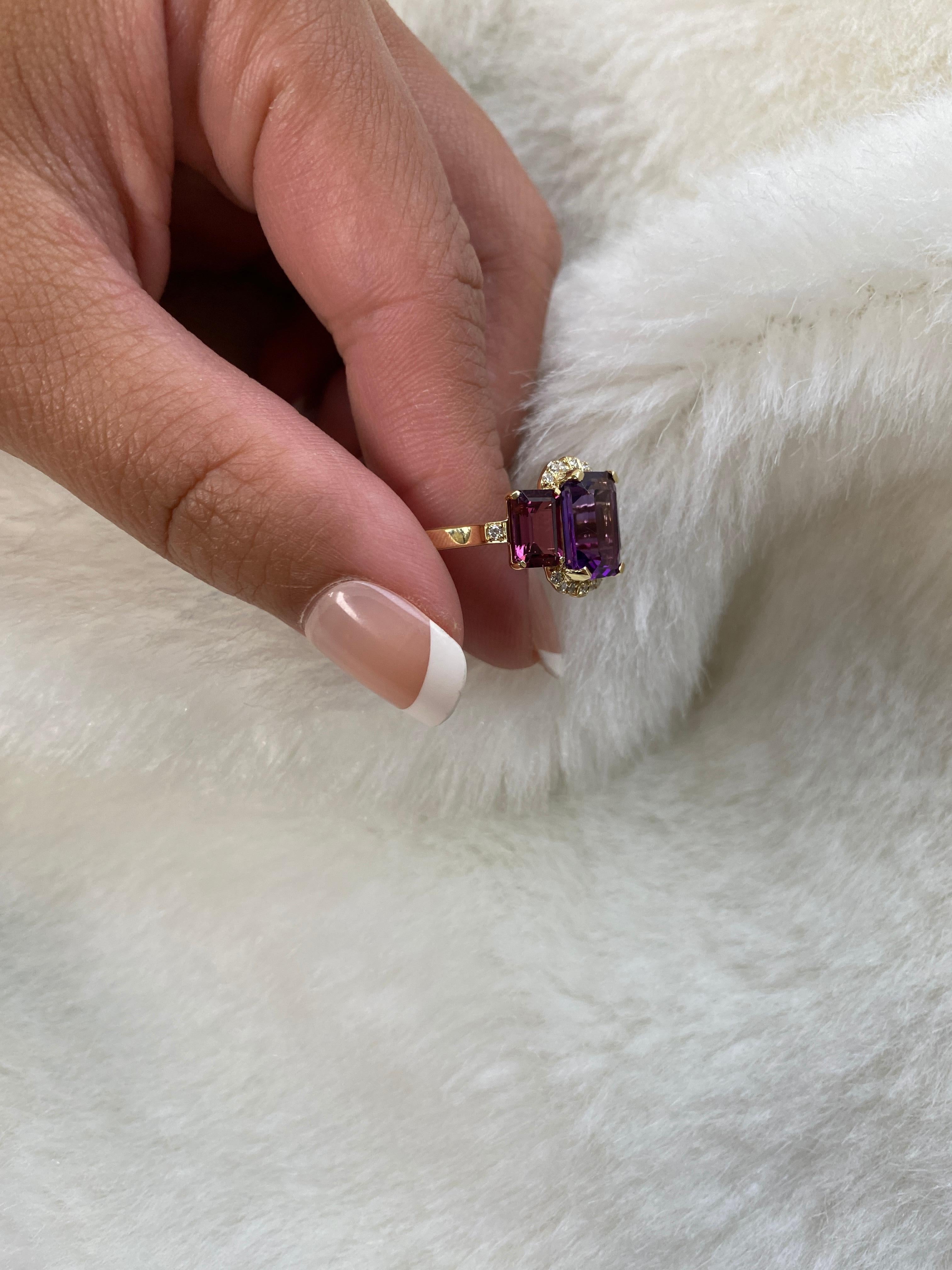 A perfect combination of Amethyst and Garnet is this 3 Stone Emerald Cut Ring with Diamonds set in 18K Yellow Gold. From our popular 'Gossip' Collection, this piece carries a hint of shock value.

* Stone Size: 10 x 8 - 7 x 5 mm
* Gemstone: 100%