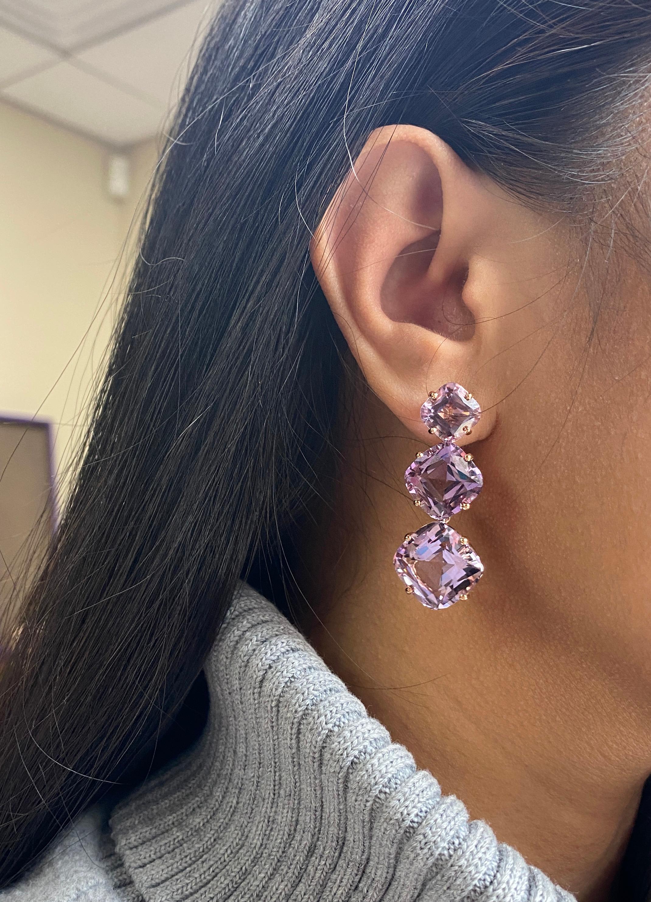 Introducing the exquisite 3 Tier Lavender Amethyst Cushion Earrings from the captivating 'Gossip' Collection. Crafted in luxurious 18K rose gold, these earrings are a true testament to elegance and sophistication. Each tier showcases a mesmerizing