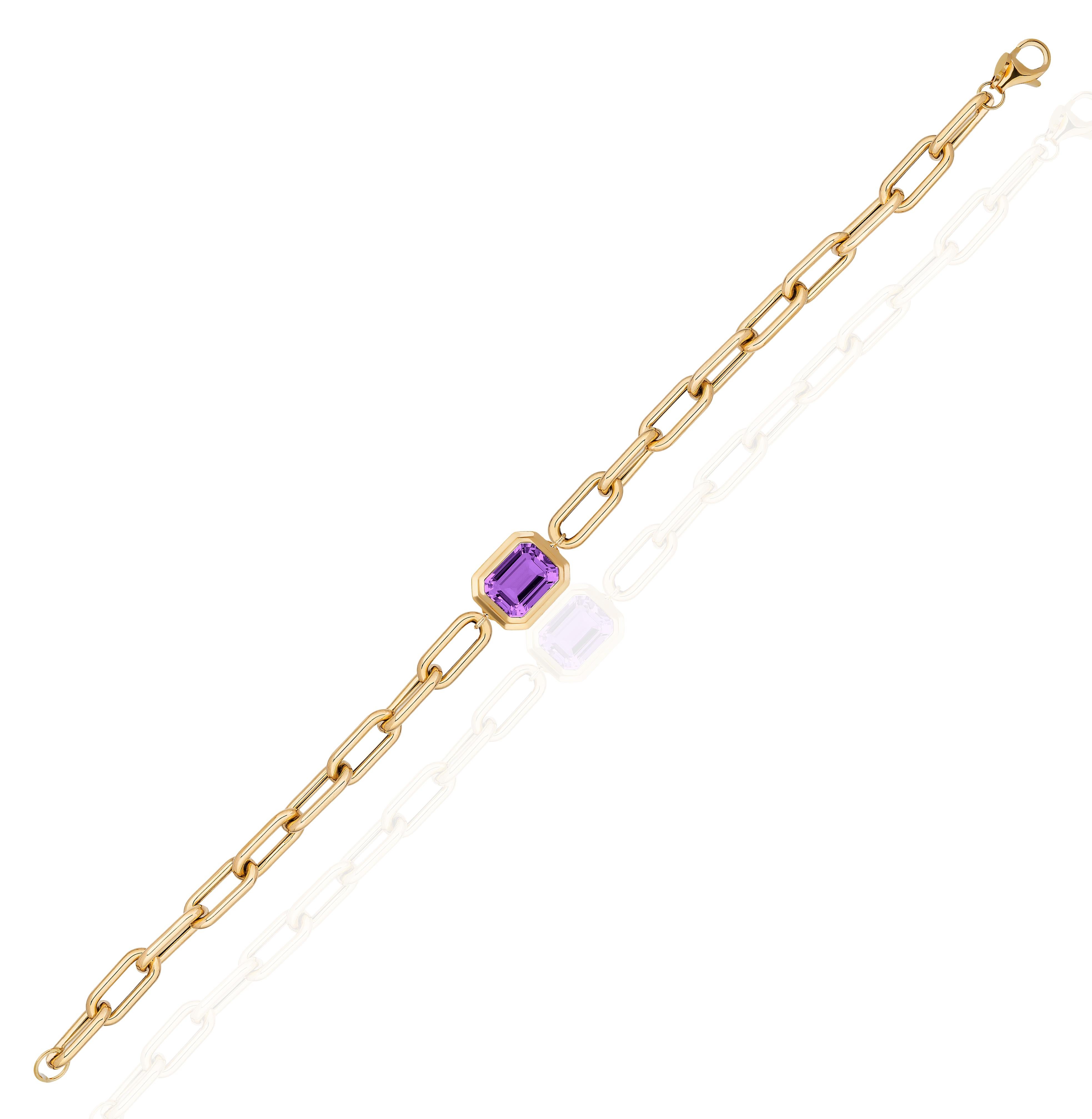 Elevate your style with the Amethyst Emerald Cut Bezel Set Bracelet in 18K Yellow Gold from our captivating 'Manhattan' Collection. Merging minimalist elegance with confident design, this bracelet captures the essence of New York City's iconic