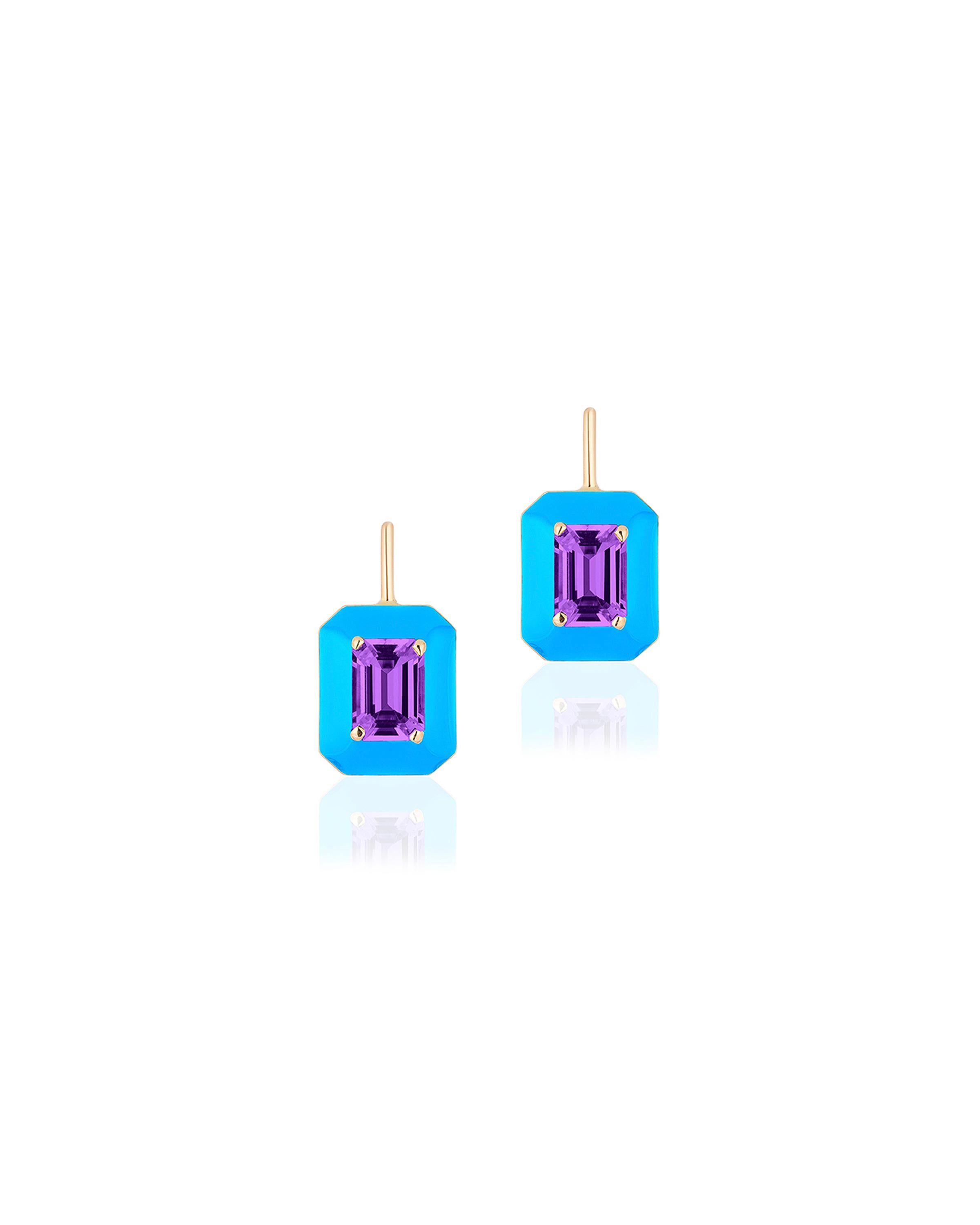 These unique earrings are an Amethyst Emerald Cut, with Turquoise Enamel border and Lever back. From our ‘Queen’ Collection, it was inspired by royalty, but with a modern twist. The combination of enamel, and Amethyst represents power, richness and