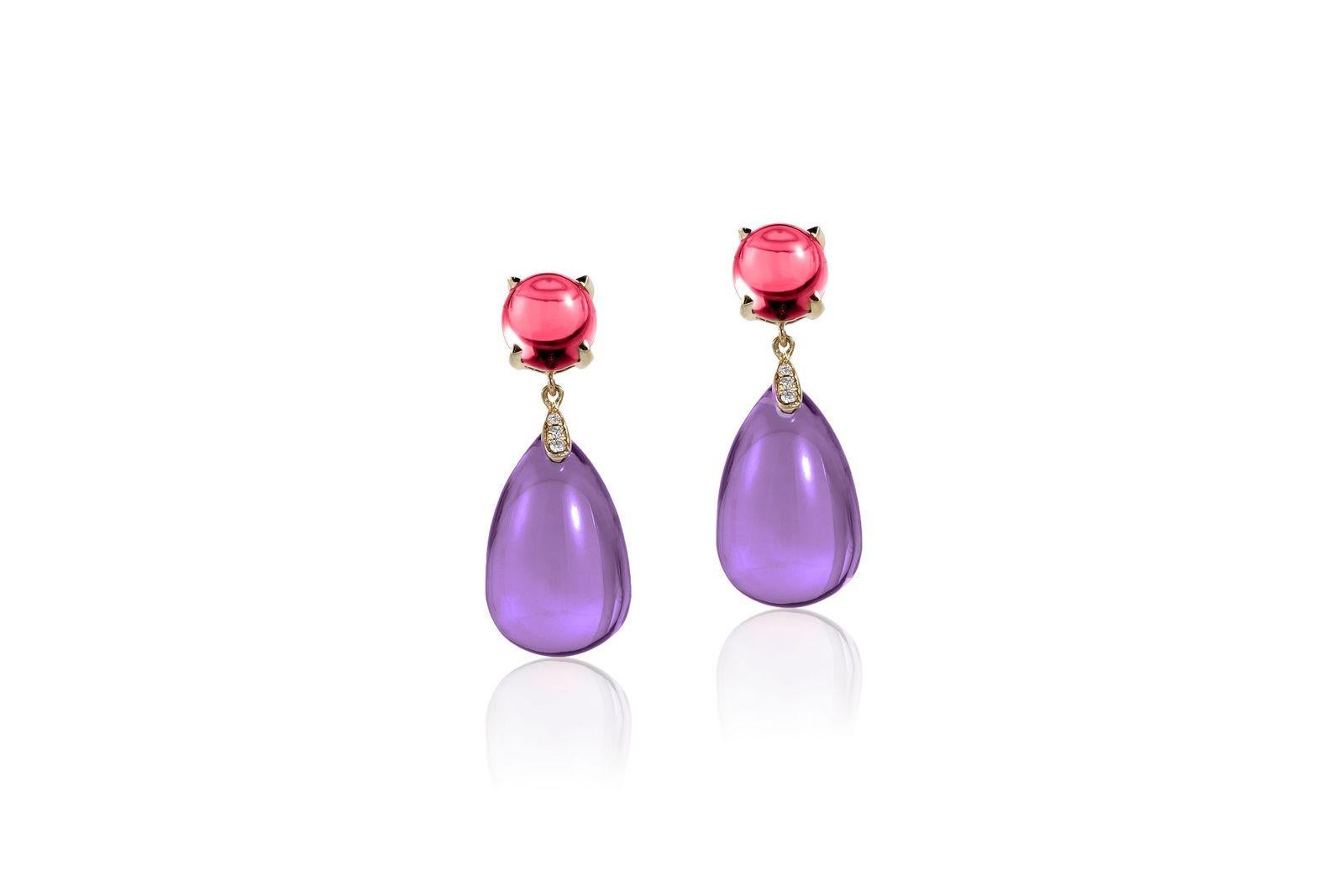 Amethyst and Garnet Cabochon Drop Earrings with Diamonds in 18K Yellow Gold, from 'Naughty' Collection

Stone Size: 19 x 12 mm & 8 mm 

Gemstone Approx Wt: Amethyst-Garnet – 42.78 Carats

Diamonds: G-H / VS, Approx Wt: 0.04 Carats