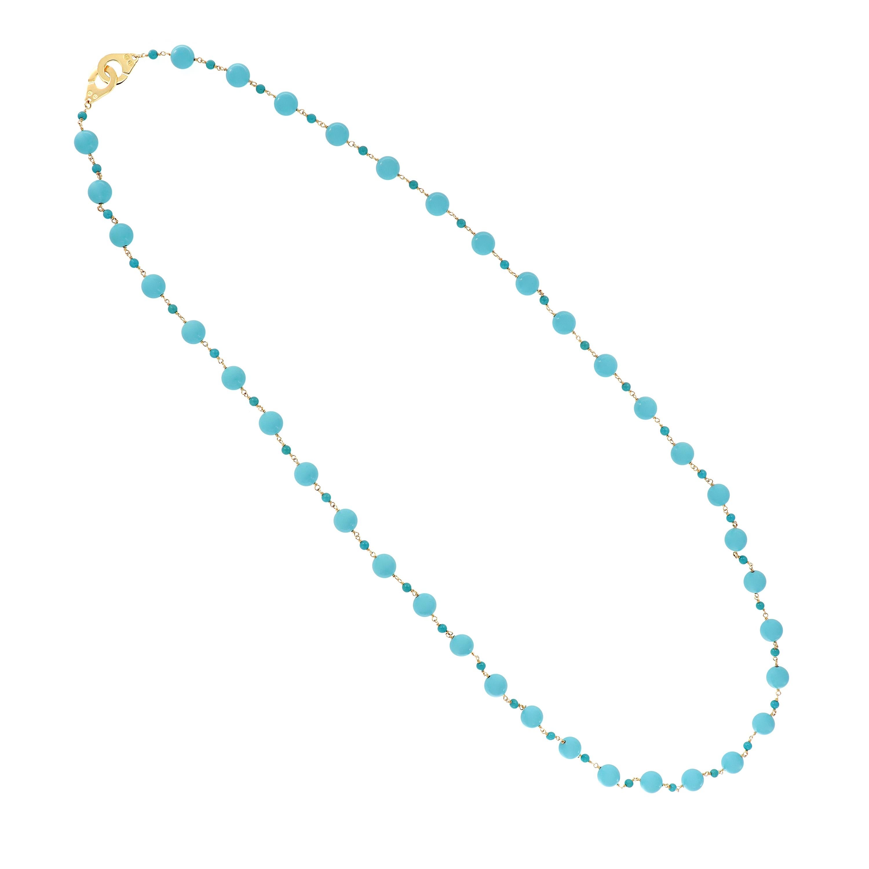 Awaken your beauty, when you pair larger and smaller round Sleeping Beauty turquoise beads on this station 18k yellow gold 26 inch chain necklace. The necklace is from the Beyond Collection designed by Goshwara. Weighs 30.7 grams. 

Turquoise 123.56