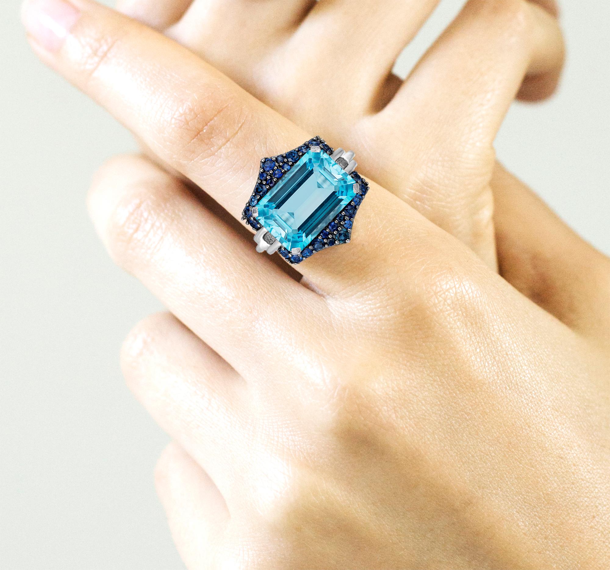 Blue Topaz and Blue Sapphire Ring in 18K White Gold, form 'Rain-Forest' Collection. This collection is thriving with luxuriant center stones and colored pave that represent the rain and the forest together. Blue for water, green for the forest,