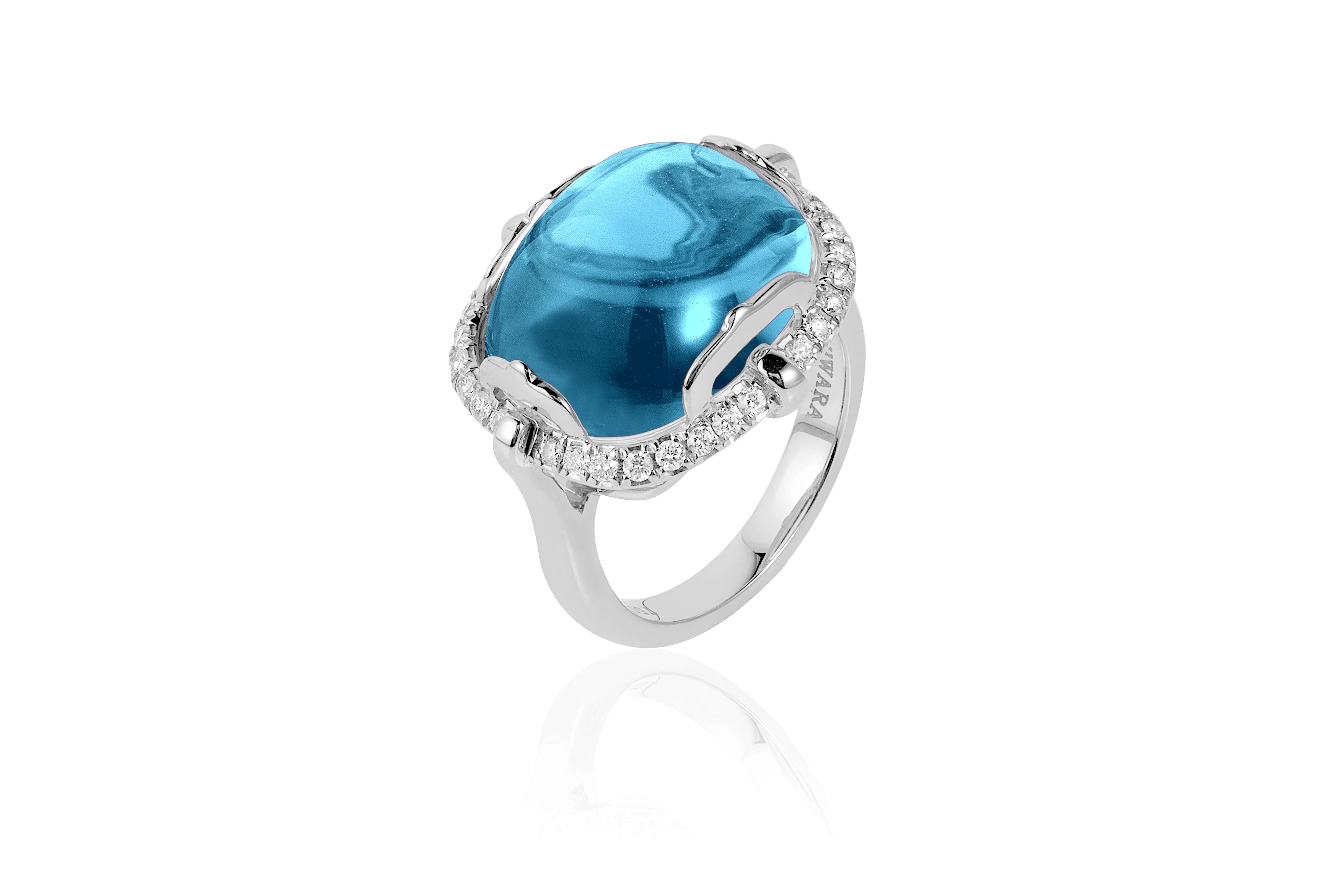 Blue Topaz Cushion Cabochon Ring in 18K White Gold with Diamonds from 'Rock 'N Roll' Collection

Stone Size: 16 x 13 mm 

Gemstone ApproxWt: Blue Topaz- 15.6 Carats

Diamonds: G-H / VS, Approx Wt: 0.34 Carats
