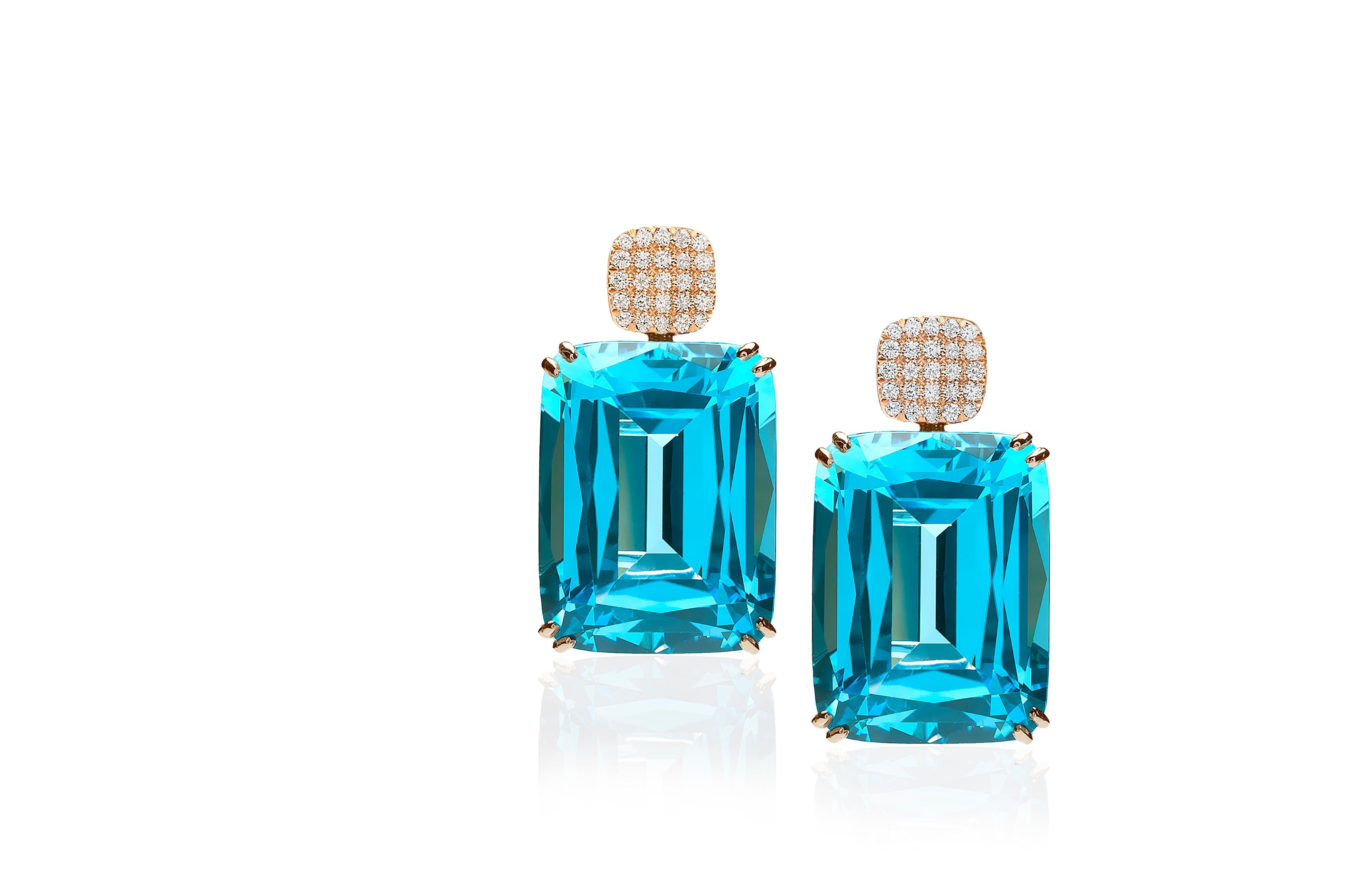 Blue Topaz Cushion Earrings with Diamonds Motif in 18K Yellow Gold, from ‘Gossip’ Collection

Stone Size 20 X 15mm 

Gemstone Approx. Wt: Blue Topaz- 46.07 Carats 

Diamonds: G-H / VS, Approx. Wt: 0.36 Carats