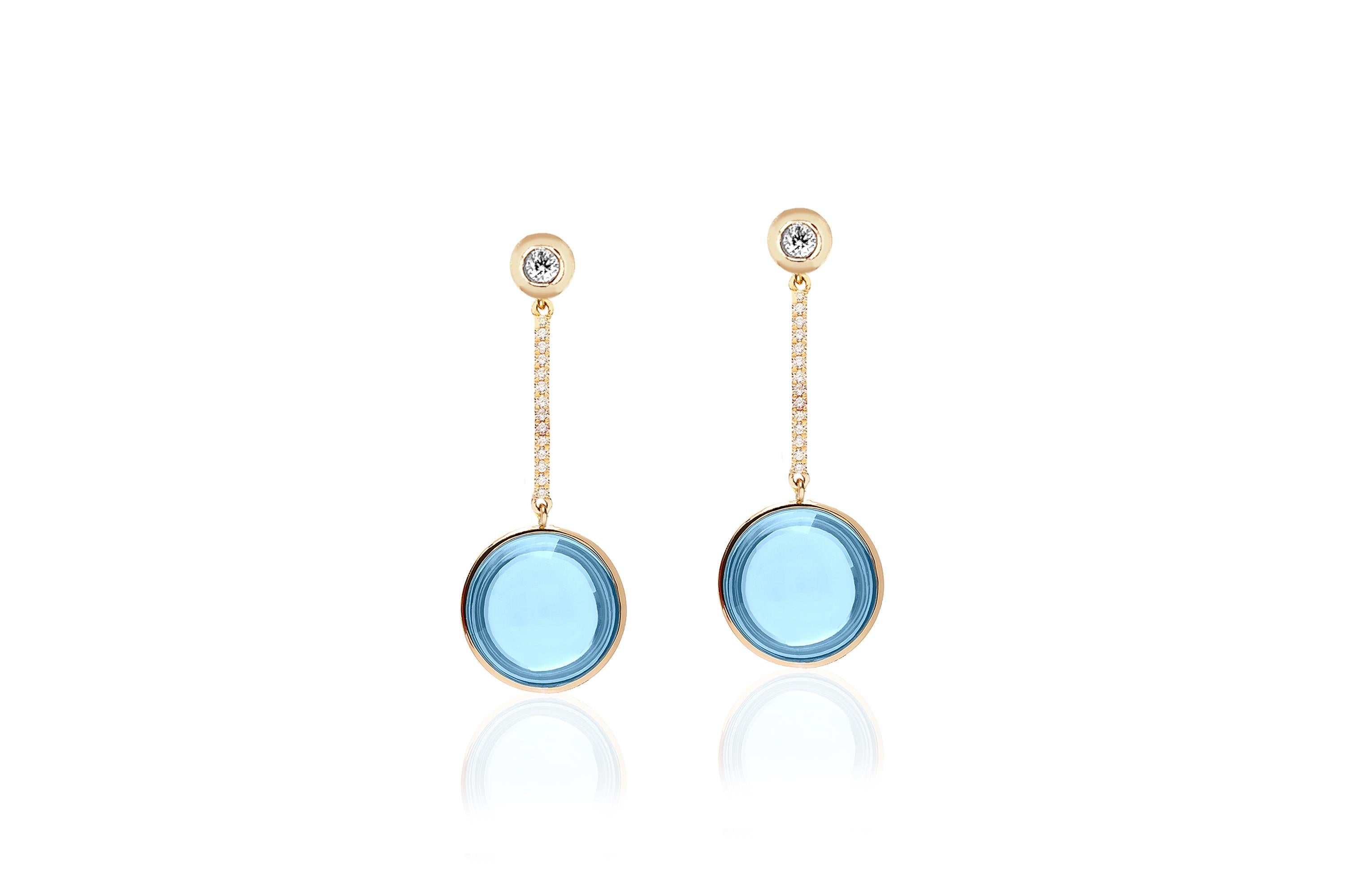 The Blue Topaz Disc Earring with Diamonds in 18K Yellow Gold is a stunning piece of jewelry from the exclusive 'G-One' Collection. Crafted with precision and elegance, these earrings feature a round disc-shaped blue topaz gemstone as the