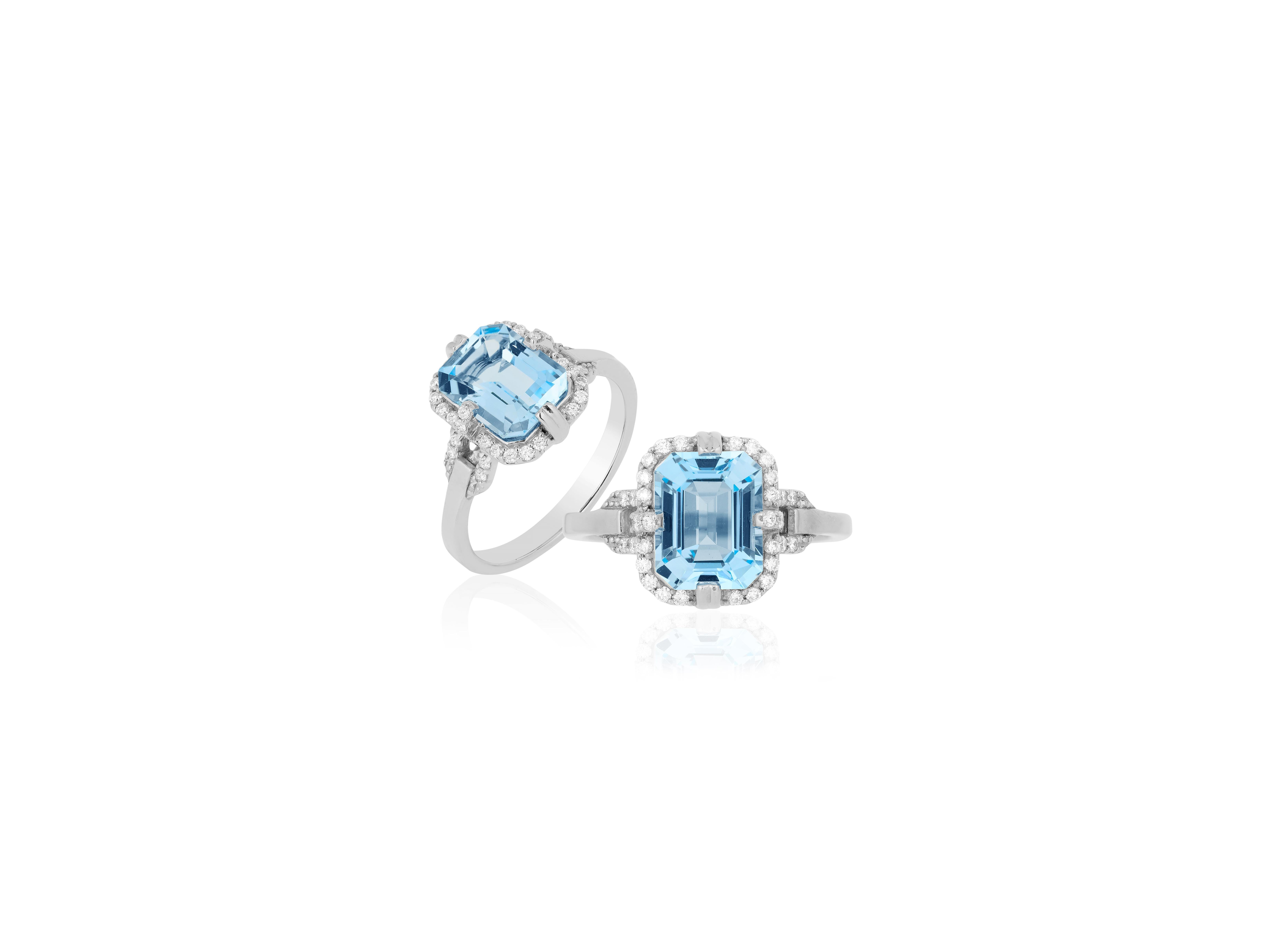 Contemporary Goshwara Blue Topaz Emerald Cut and Diamond Ring For Sale