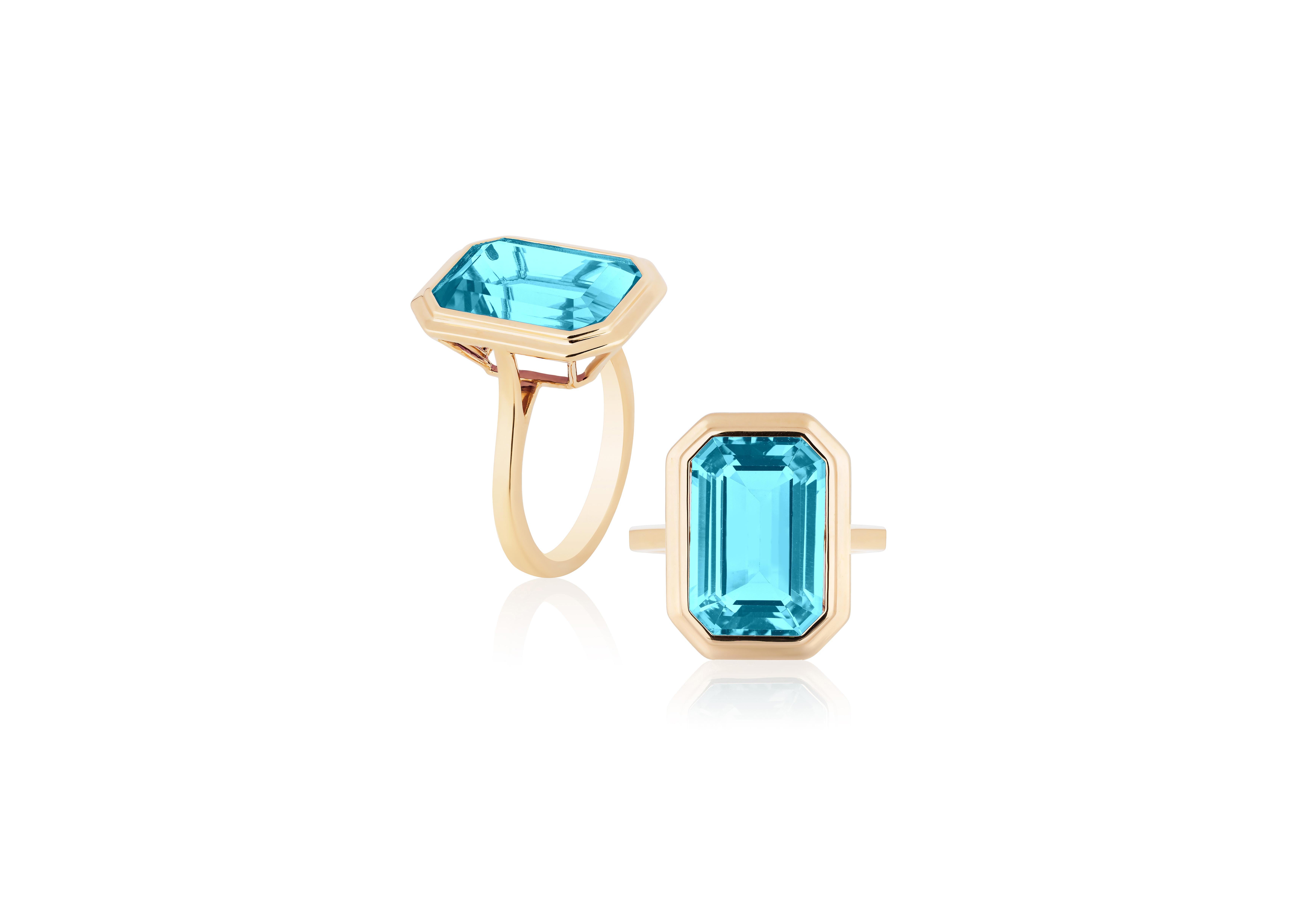 A classic yet an everyday bold statement piece, this amazing cocktail ring is part of our very new ‘Manhattan’ Collection. It has a 10 x 15 mm emerald cut Blue Topaz in a bezel setting in 18k gold.   ​

Minimalist lines yet bold structures is what