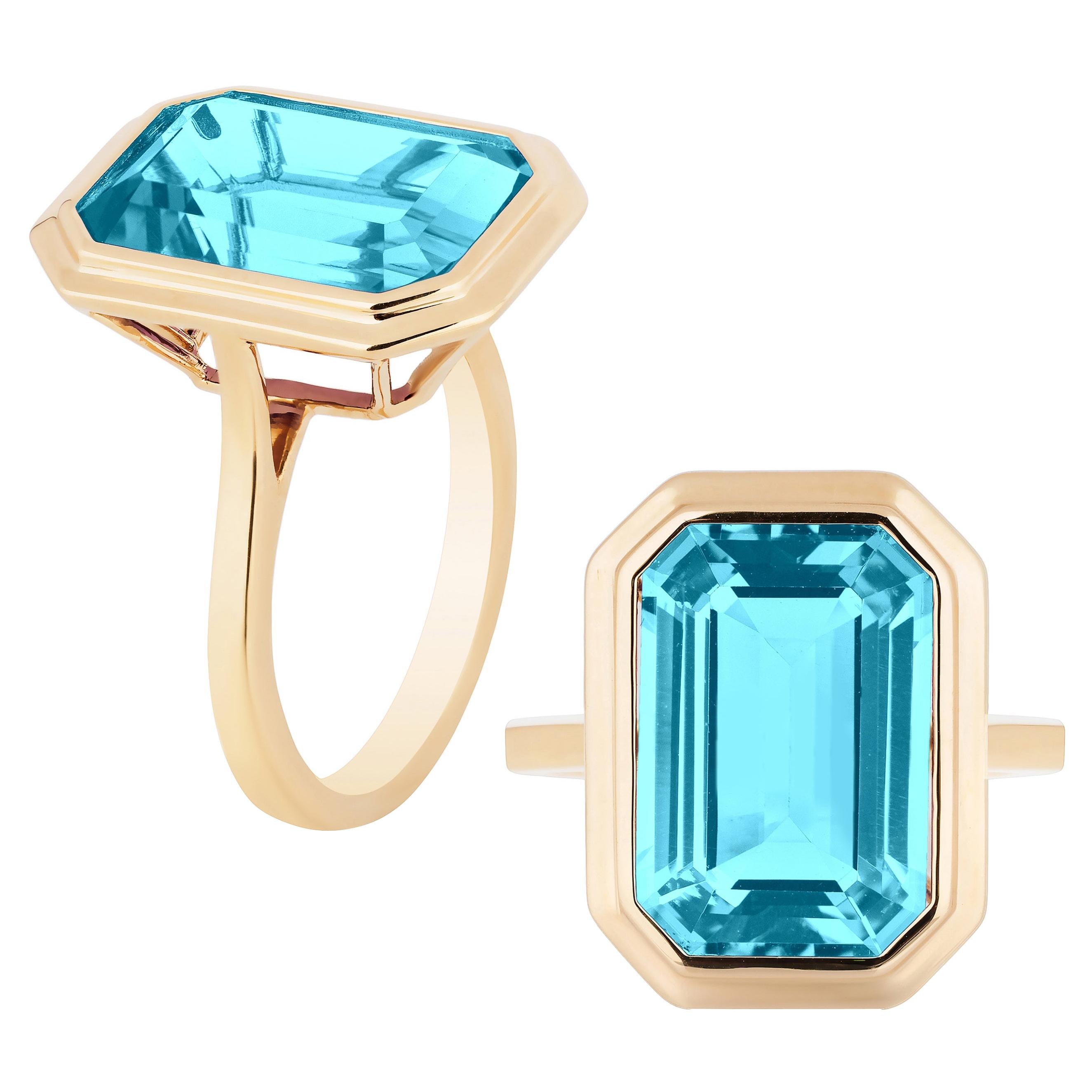 Goshwara Blue Topaz Emerald Cut Bezel Set Ring For Sale