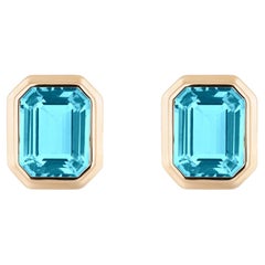 Goshwara Blue Topaz Emerald Cut Bezel Set Stud Earrings