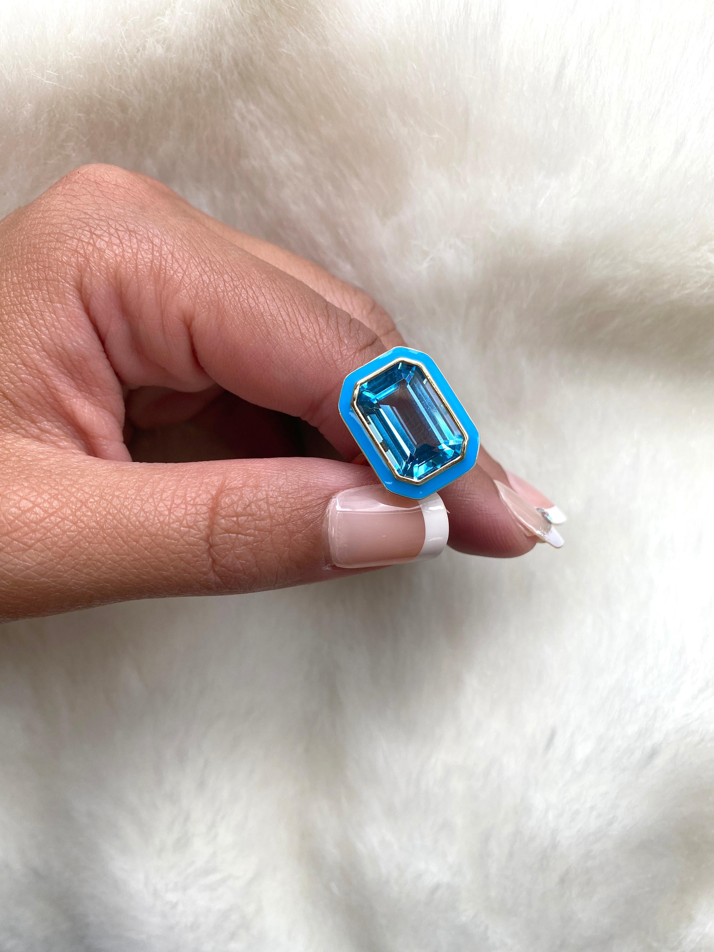 Contemporary Goshwara Blue Topaz Emerald Cut in a Bezel Setting Ring For Sale