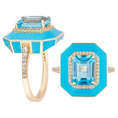 Ring mitshwara-blauem Topas im Smaragdschliff mit Diamanten und türkisfarbener Emaille