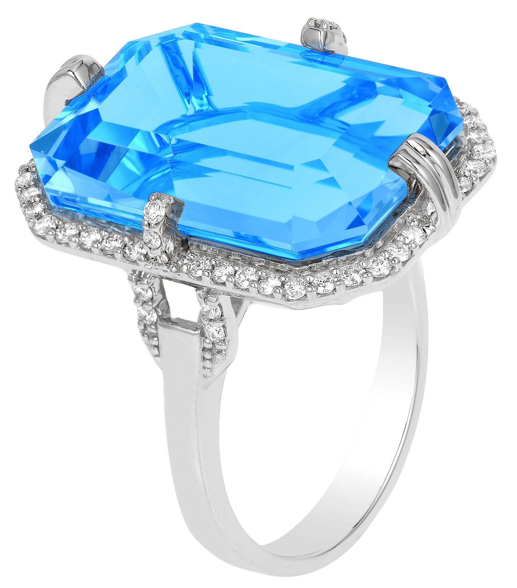 Blue Topaz Emerald Cut Ring with Diamonds in 18K White Gold, From 'Gossip' Collection

Stone Size: 20 x 14 mm 

Gemstone Approx Wt: Blue Topaz - 22.80 Carats

Diamonds: G-H / VS, Approx Wt: 0.41 Carats