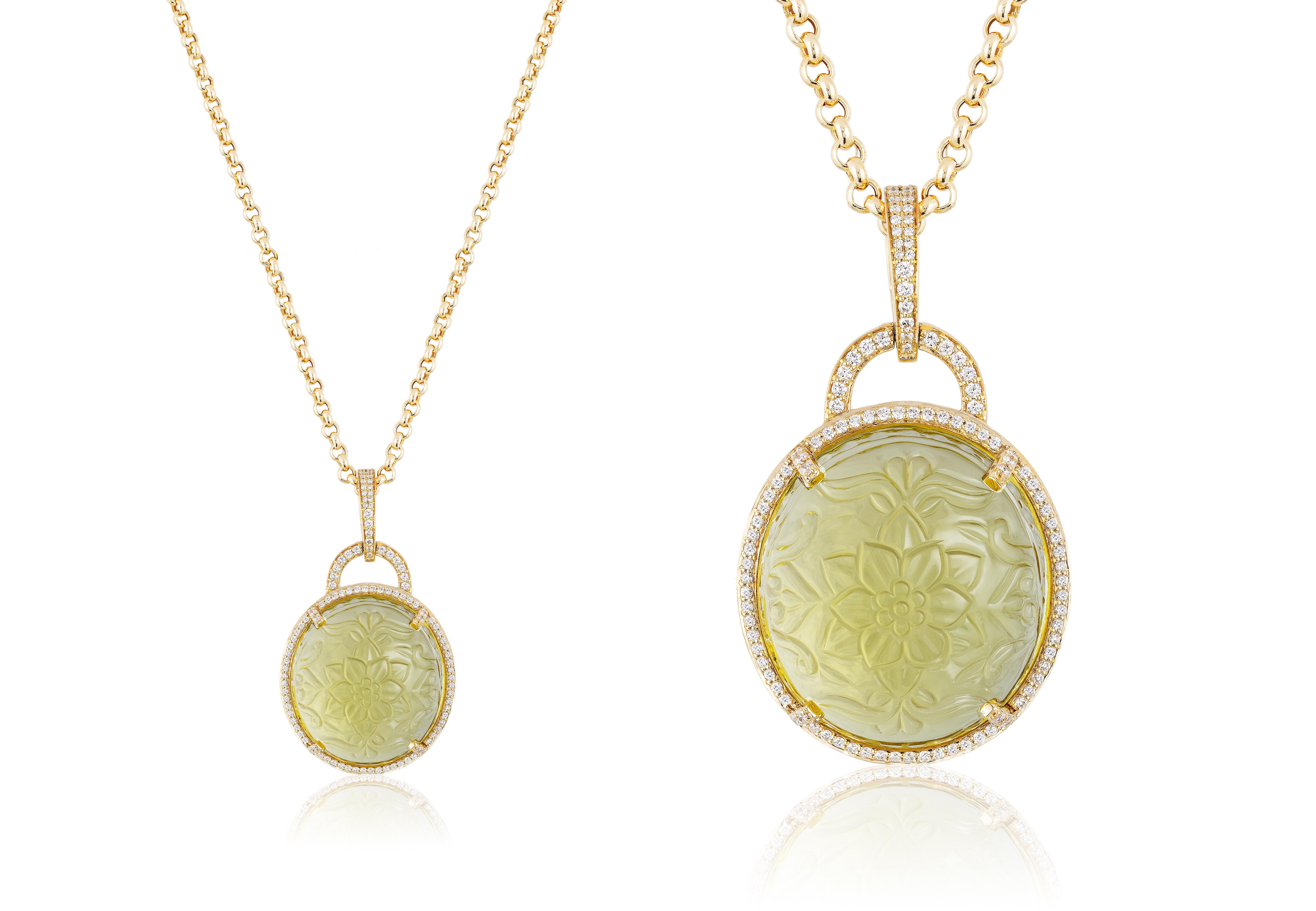 This Oval Lemon Quartz Carved Pendant with Diamonds in 18K Yellow Gold is a stunning piece from the 'Rock 'N Roll' Collection. This pendant features a beautifully carved oval-shaped lemon quartz stone set in 18K yellow gold, surrounded by sparkling