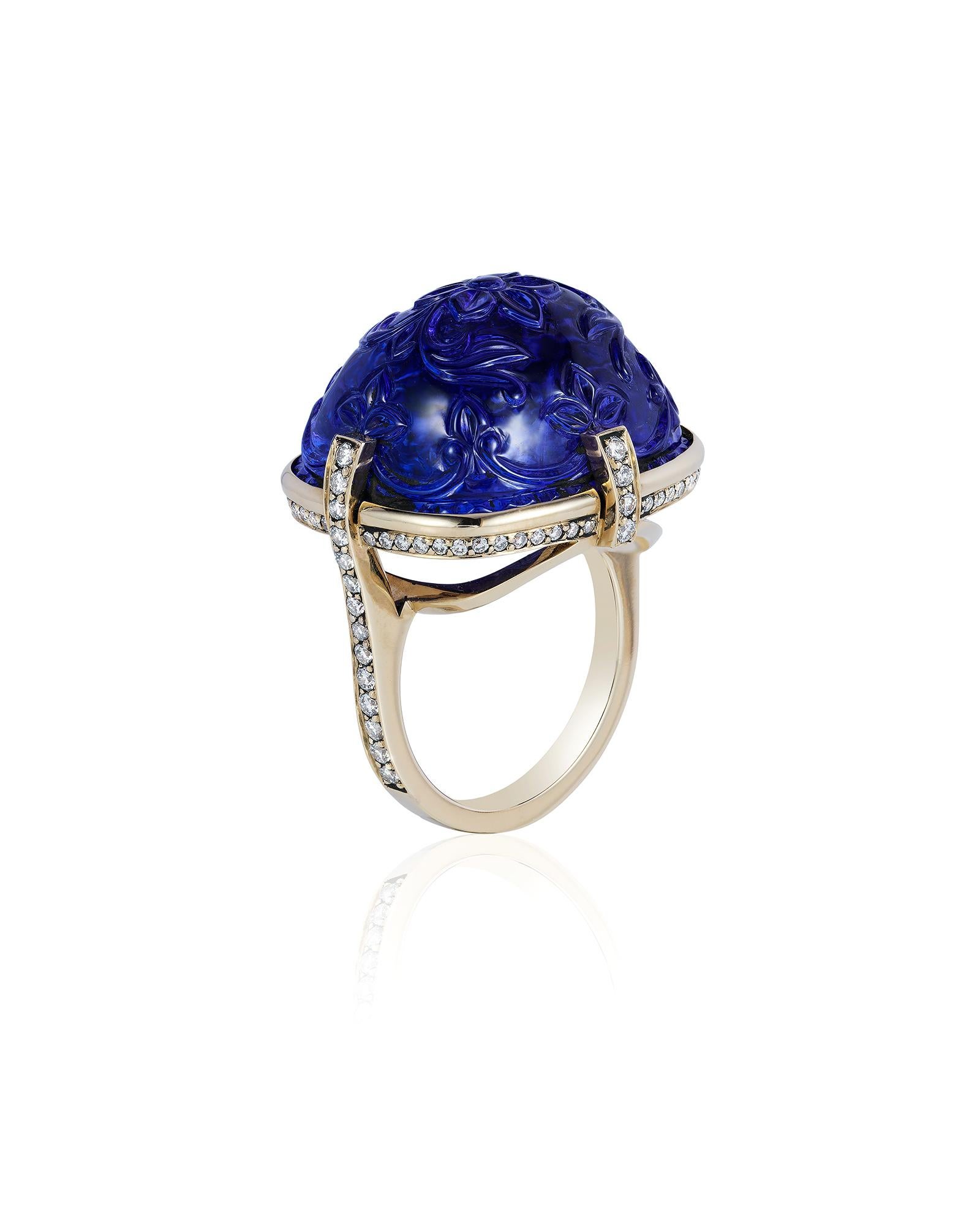 Tanzanite Sugarloaf Carved 4 prong Ring in 18K White Gold with Diamonds, from 'G-One' Collection. Our G-One Collection undeniably carries the most special pieces of Goshwara. The sought-after, one-of-a-kind pieces speak to each unique personality of