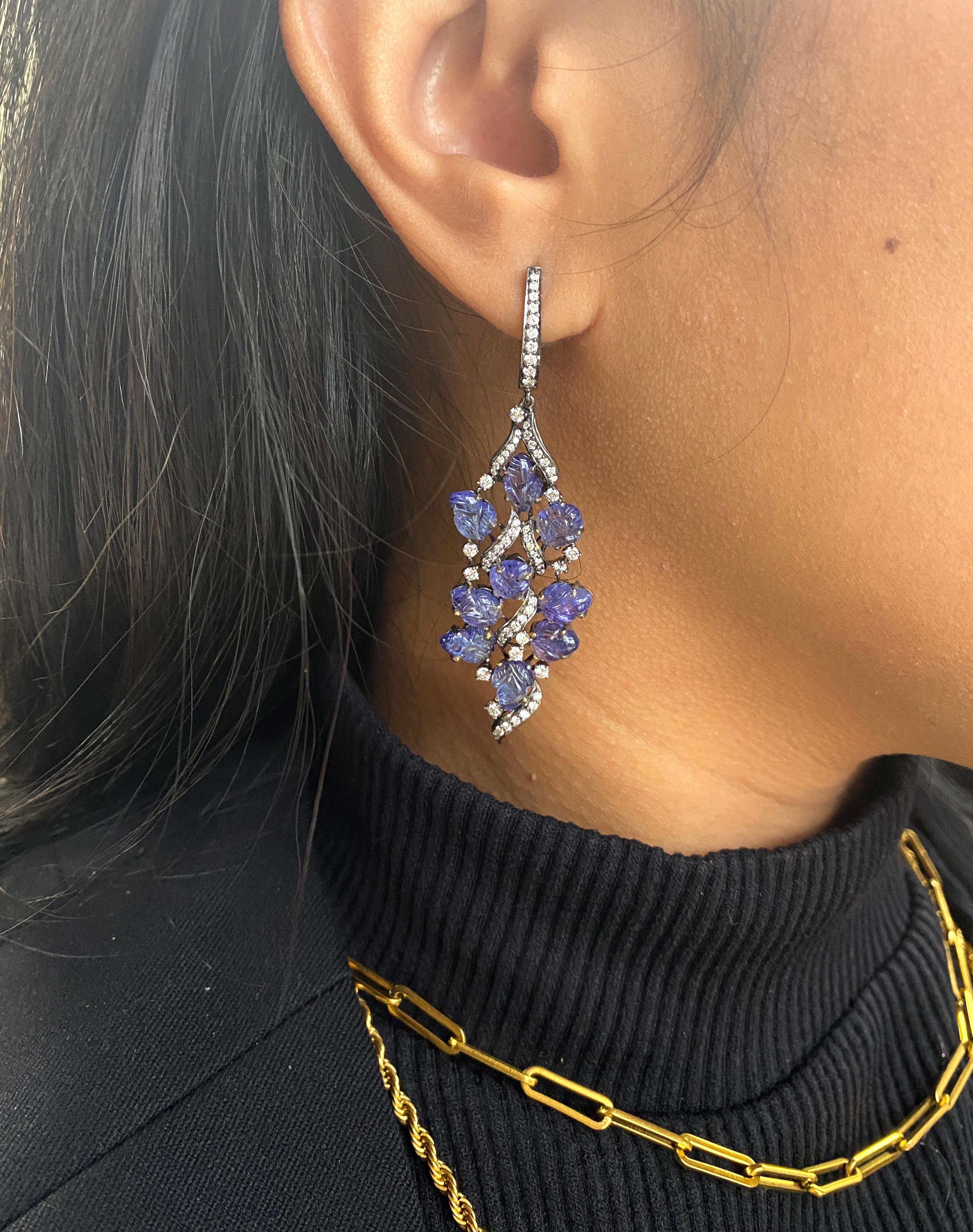 Carved Tanzanite Leaf Chandelier Earrings with Diamonds in 18K Yellow Gold, from 'G-One' Collection. If you want to make a statement, this is the perfect piece to do it!

* Gemstone: 100% Earth Mined 
* Approx. gemstone Weight: 12.16 Carats