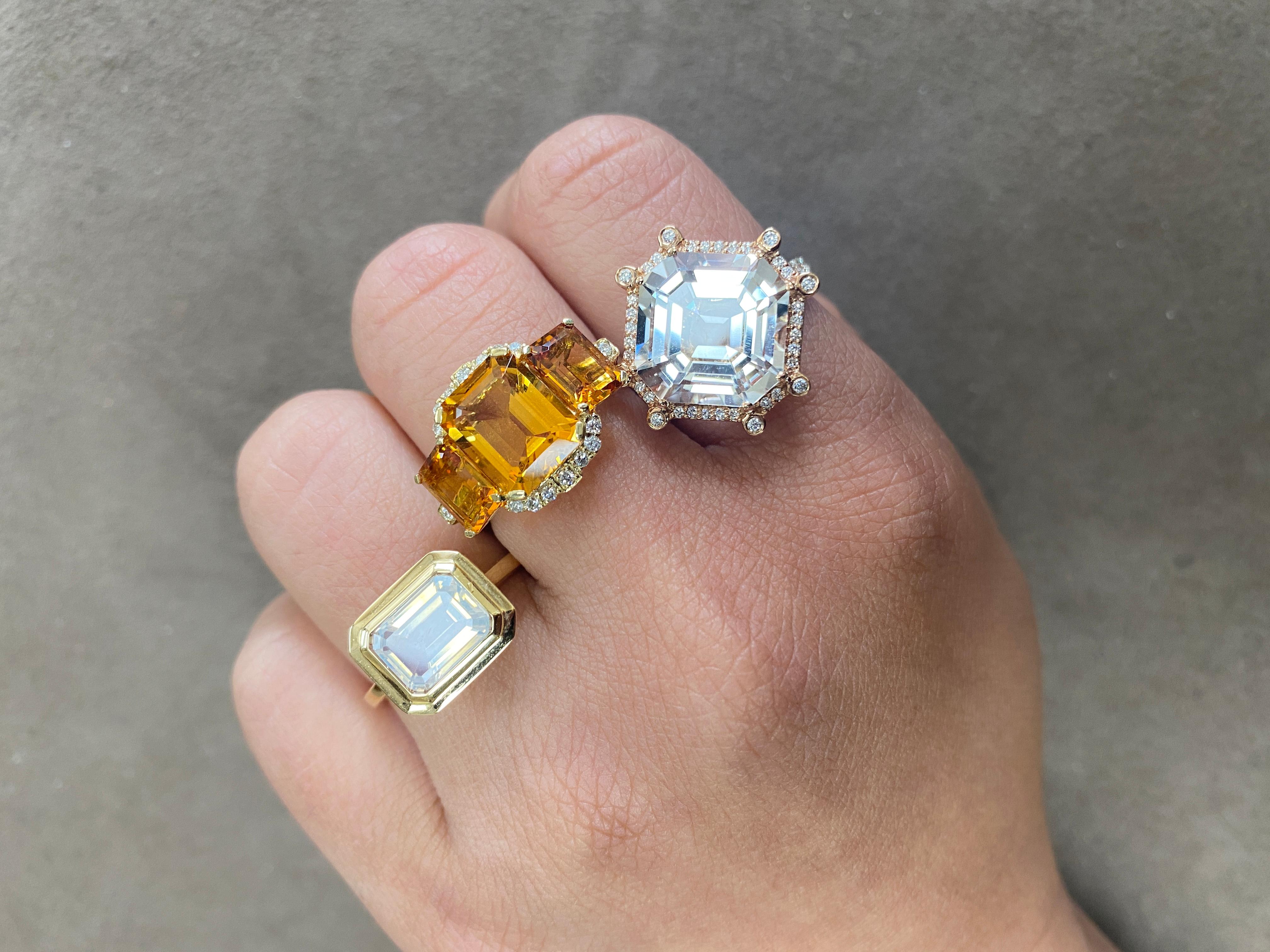 Citrine 3 Stone Emerald Cut Ring with Diamonds set in 18K Yellow Gold. From our popular 'Gossip' Collection, this piece carries a hint of shock value.

* Stone Size: 10 x 8 - 7 x 5 mm
* Gemstone: 100% Earth Mined 
* Approx. gemstone Weight: 4.64
