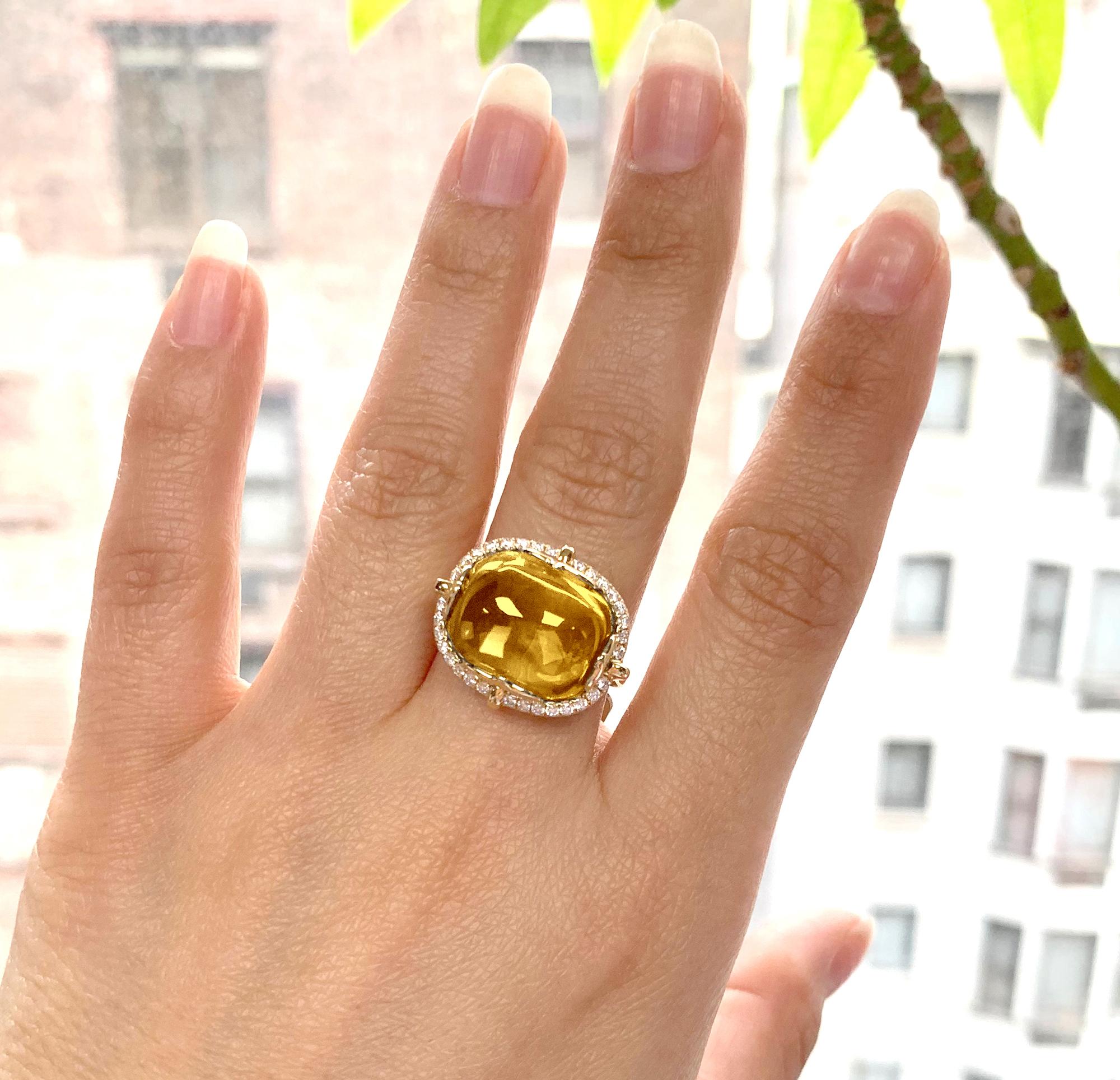 Citrine Cushion Cabochon Ring in 18K Yellow Gold with Diamonds, from 'Rock 'N Roll' Collection

Stone Size: 16 x 13 mm 

Diamonds: G-H / VS, Approx Wt: 0.34 Cts