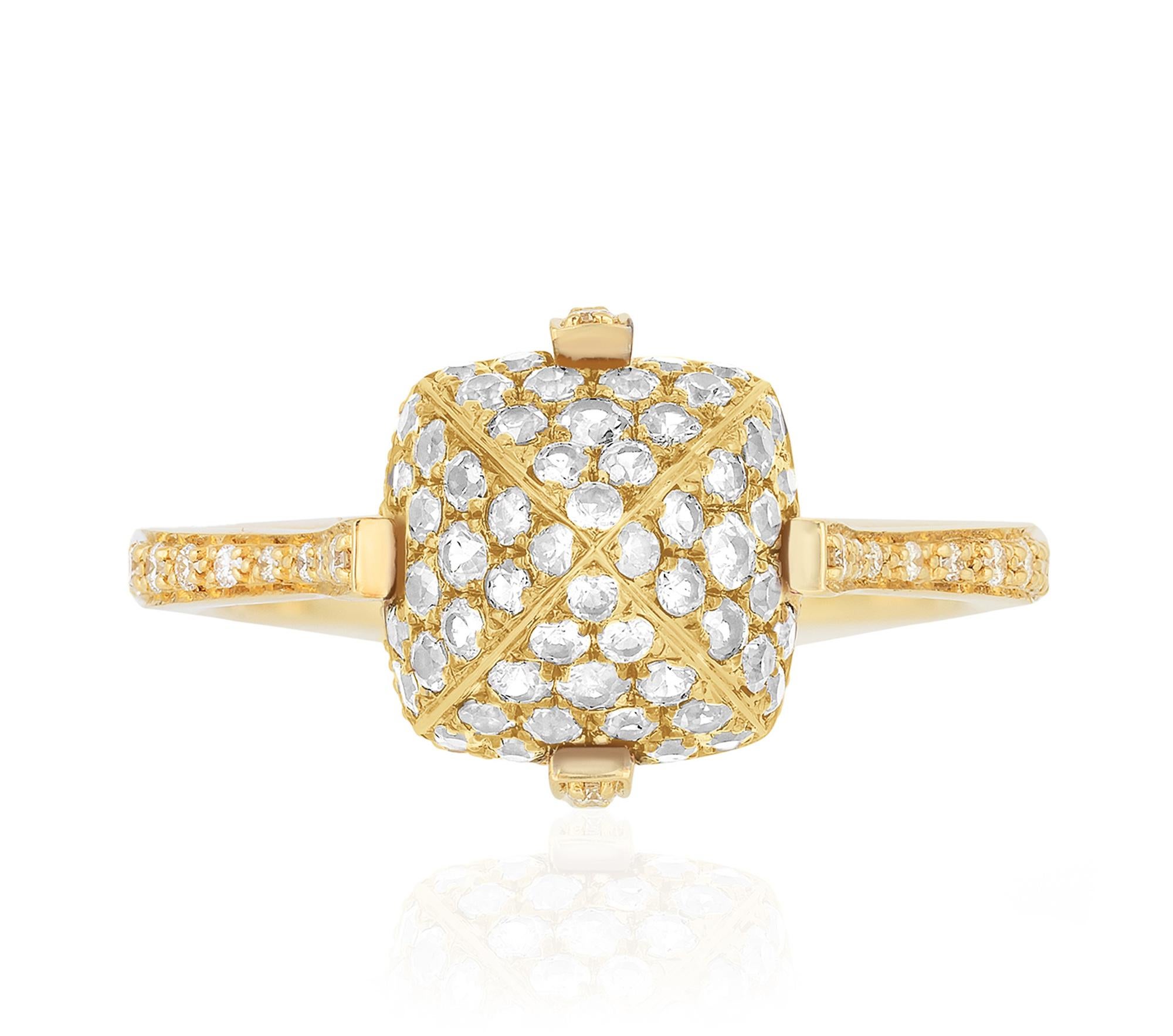 The Diamond & Gold Sugarloaf Pave Ring is an exquisite piece of jewelry crafted in luxurious 18K Yellow Gold. This striking ring features a captivating design with dazzling diamonds, creating a perfect balance of elegance and opulence. A timeless