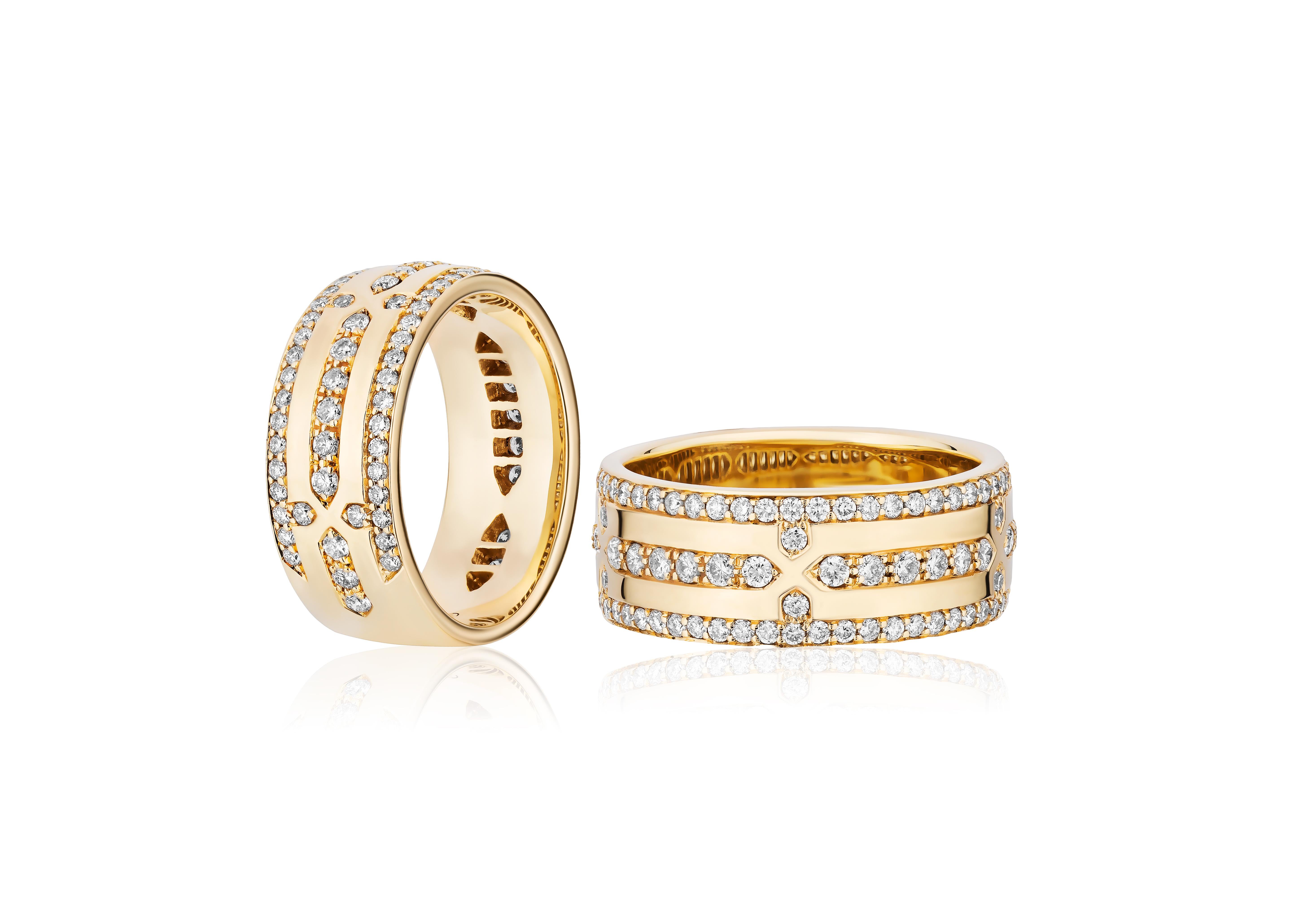 This Diamond & Gold Wide Band from the 'G-Classics' Collection is a luxurious and eye-catching piece of jewelry crafted in exquisite 18K yellow gold. This wide band is adorned with dazzling diamonds and features a timeless design that effortlessly