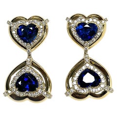 Boucles d'oreilles Goshwara en saphir bleu en forme de double cœur avec diamants