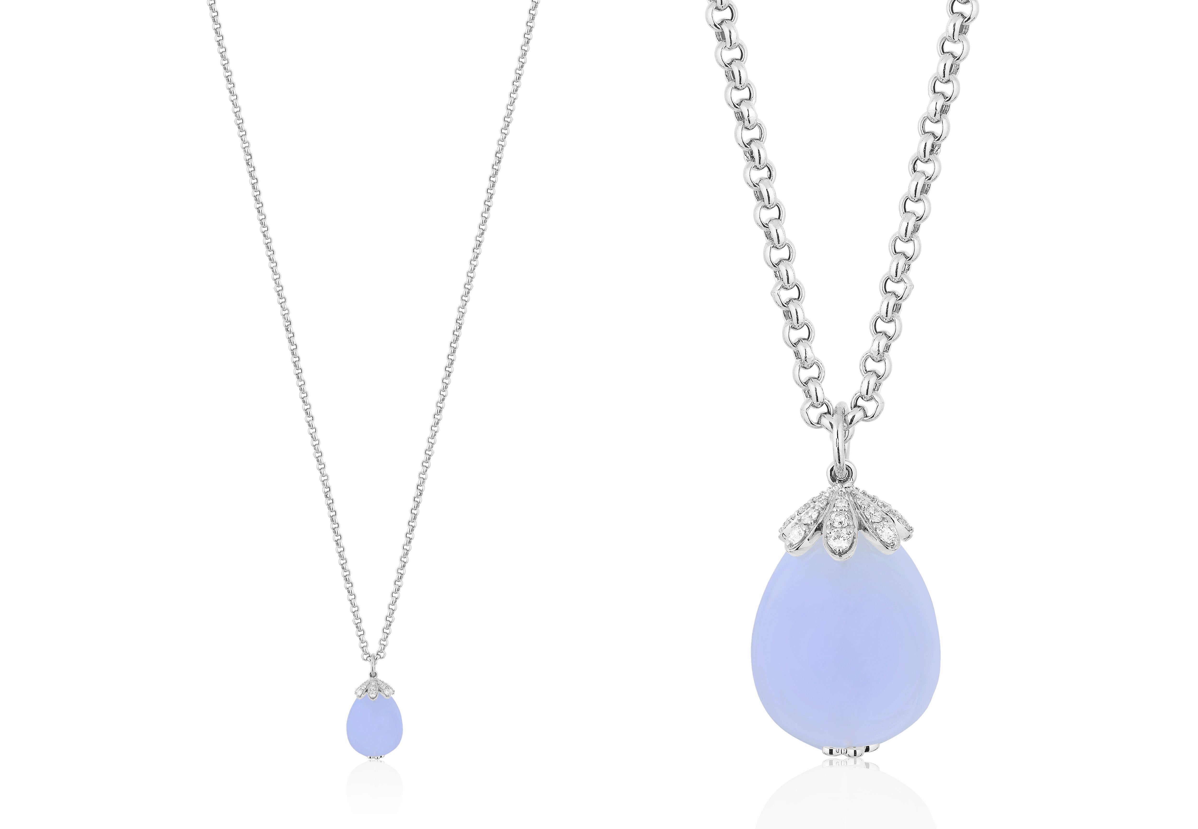 Drop Blue Chalcedony Pendant with Diamonds in 18K White Gold with Black Rhodium, from 'Naughty' Collection
Stone size: 22.75 X 18 mm
Gemstone Approx Wt: Chalcedony- 49.63cts. 
Diamonds: G-H / VS, Approx Wt: 0.56 Carats.