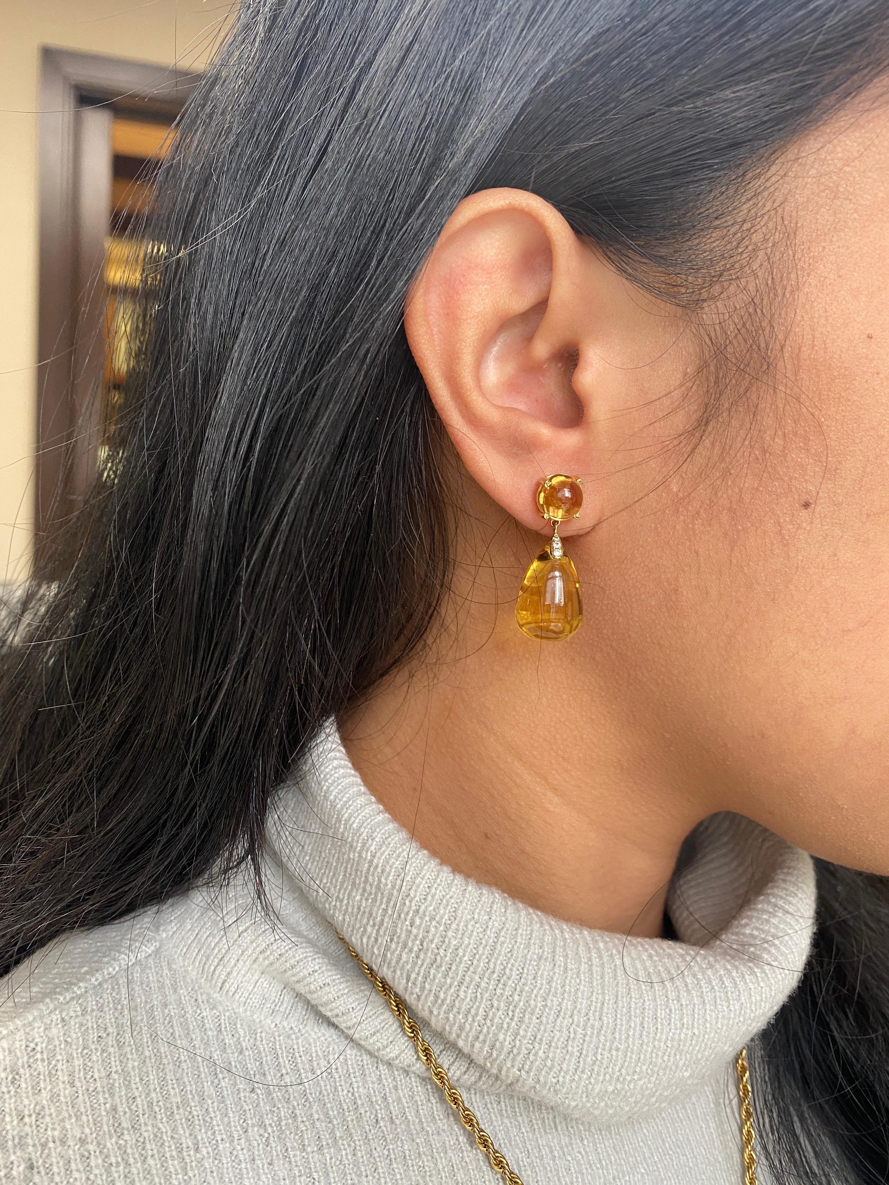 Beautiful Drop Cabochon Citrine Earrings with Diamonds in 18K Yellow Gold, from ‘Naughty' Collection. This collection has dangerous curves tied with exotic colors. When unveiled, these pieces will bring a smile to the conservative aficionado.

*