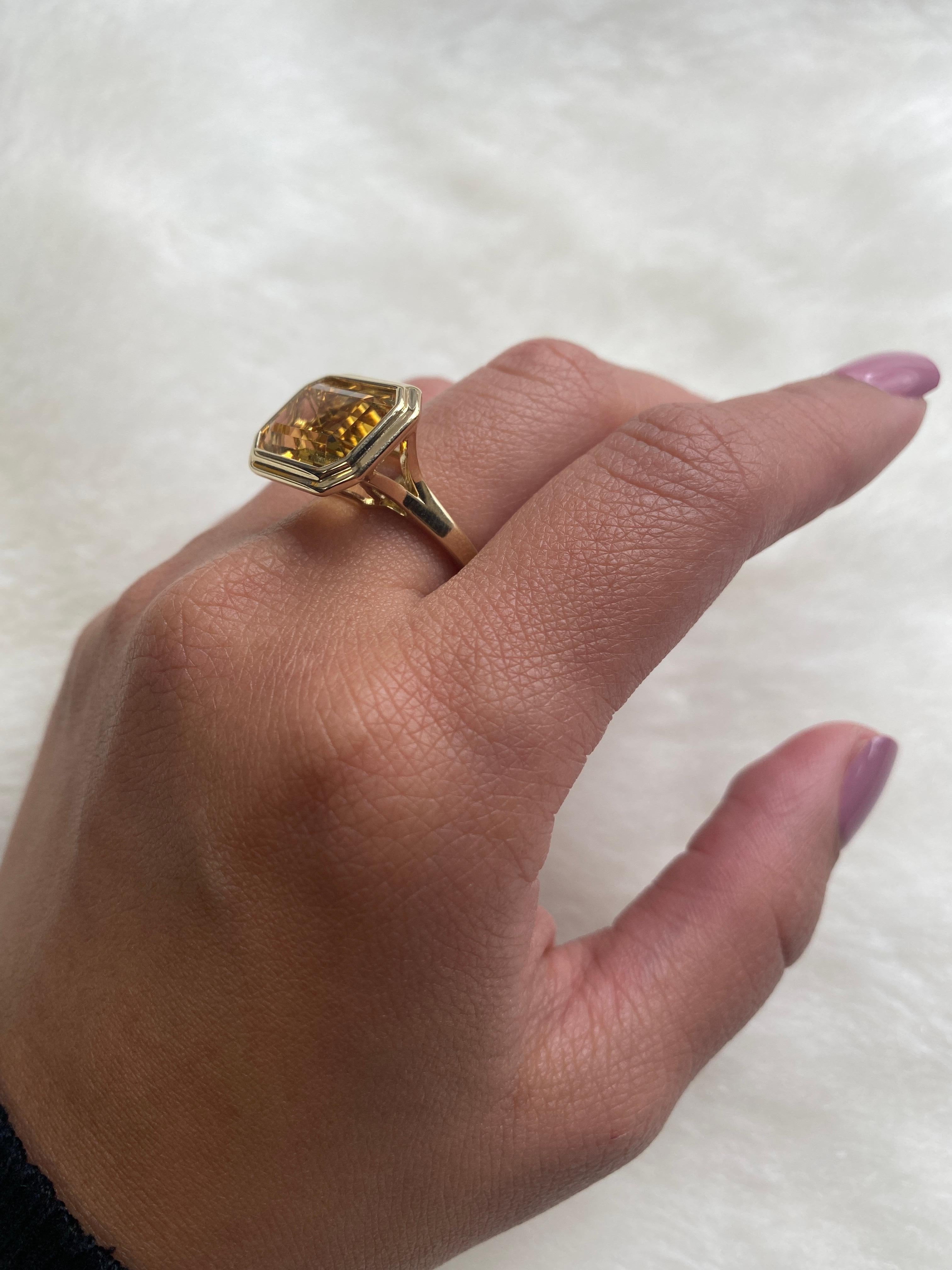 East-West Citrine Emerald Cut Bezel Set Ring in 18K Yellow Gold, from 'Manhattan' Collection.  Minimalist lines yet bold structures is what our Manhattan Collection is all about. Our pieces represent the famous skyline and cityscapes of New York