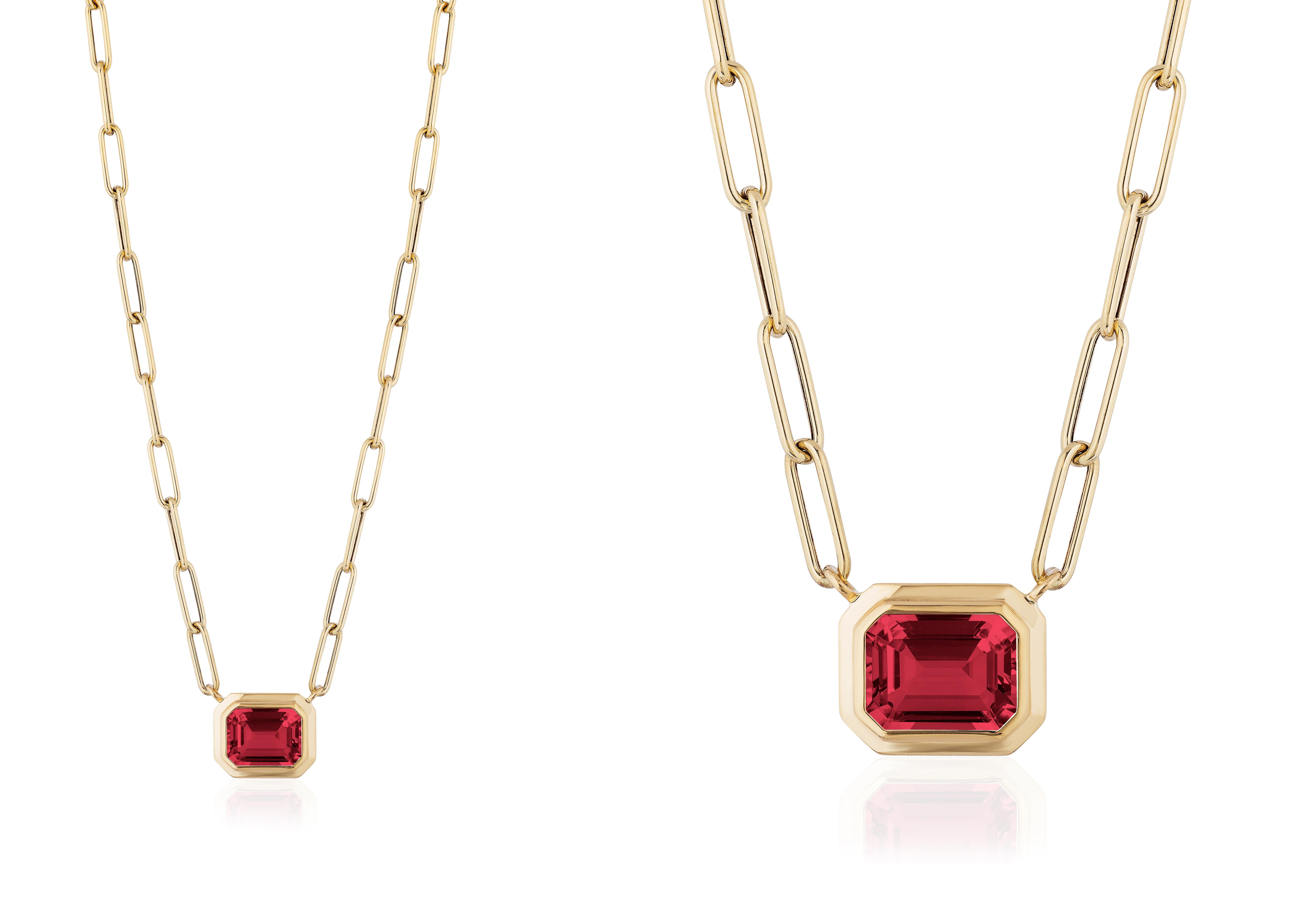 This beautiful East-West Garnet Emerald Cut Bezel Set Pendant in 18K Yellow Gold is from our ‘Manhattan’ Collection. Minimalist lines yet bold structures are what our Manhattan Collection is all about. Our pieces represent the famous skyline and