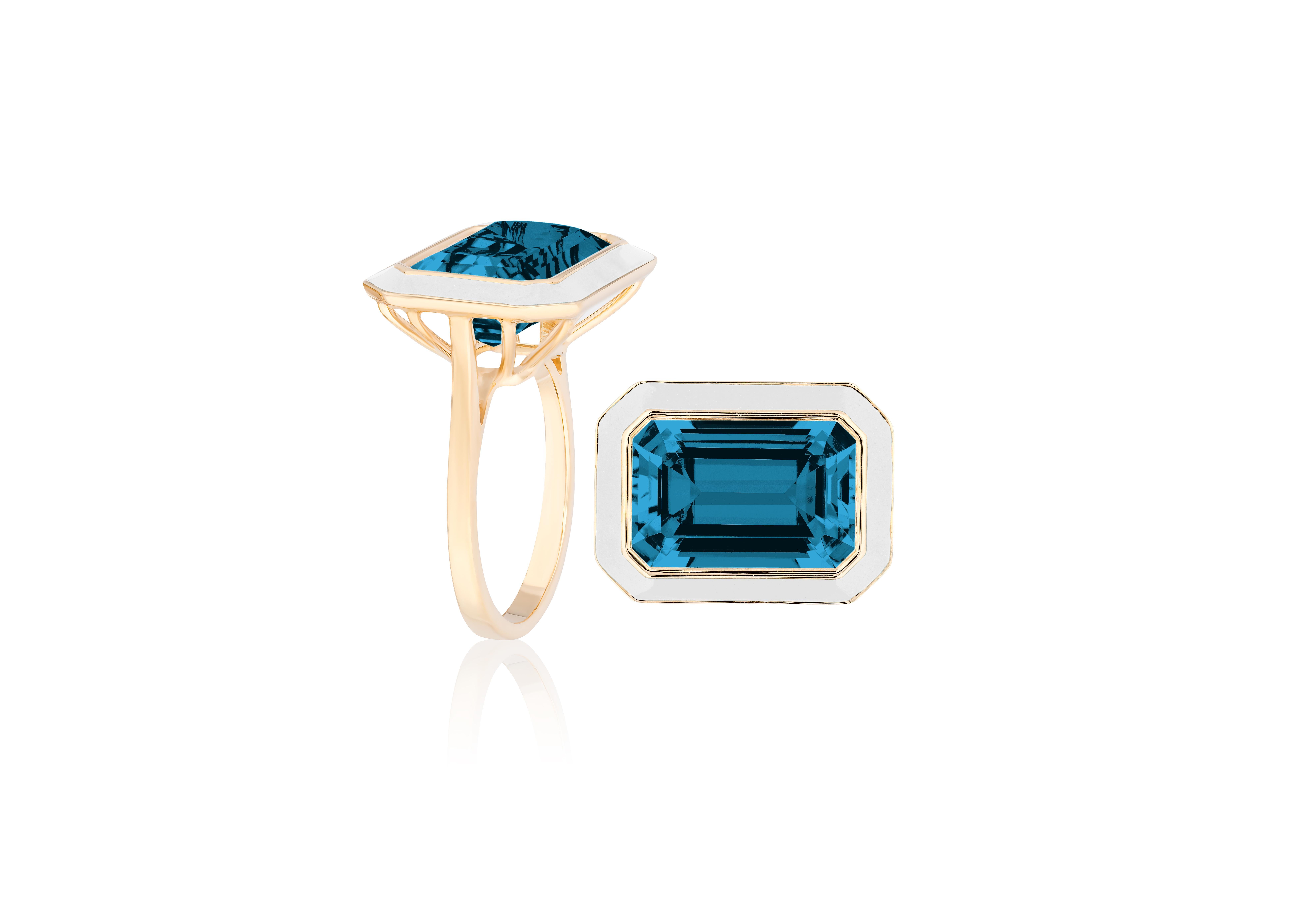 East-West London Blue Topaz Ring with White Enamel in 18K Yellow Gold, from 'Queen' Collection. The combination of enamel and London Blue Topaz represents power, richness and passion of a true Queen. The feeling of luxury is what we’re aiming for.