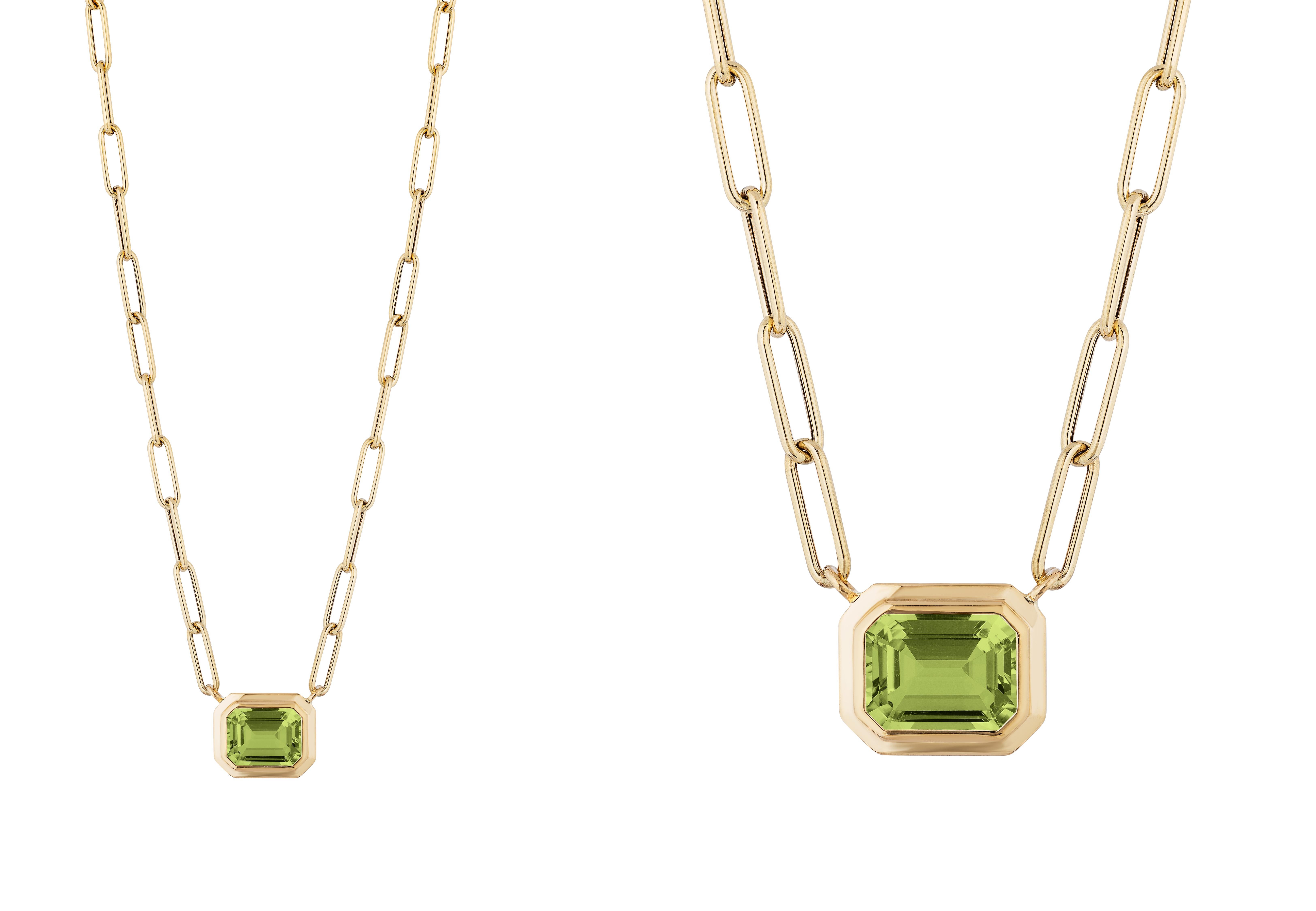 This beautiful East-West Peridot Emerald Cut Bezel Set Pendant in 18K Yellow Gold is from our ‘Manhattan’ Collection. Minimalist lines yet bold structures are what our Manhattan Collection is all about. Our pieces represent the famous skyline and