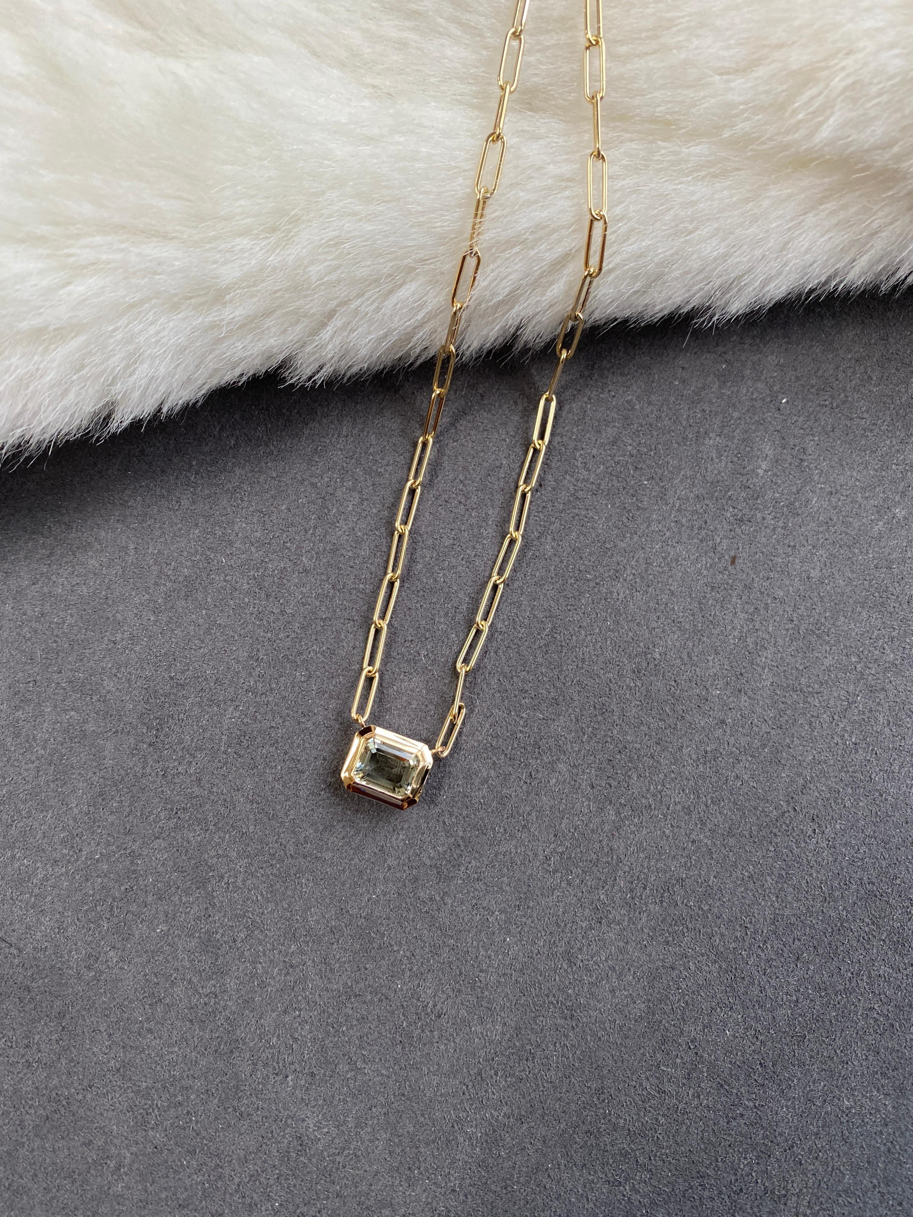 This beautiful East-West Prasiolite Emerald Cut Bezel Set Pendant in 18K Yellow Gold is from our ‘Manhattan’ Collection. Minimalist lines yet bold structures are what our Manhattan Collection is all about. Our pieces represent the famous skyline and