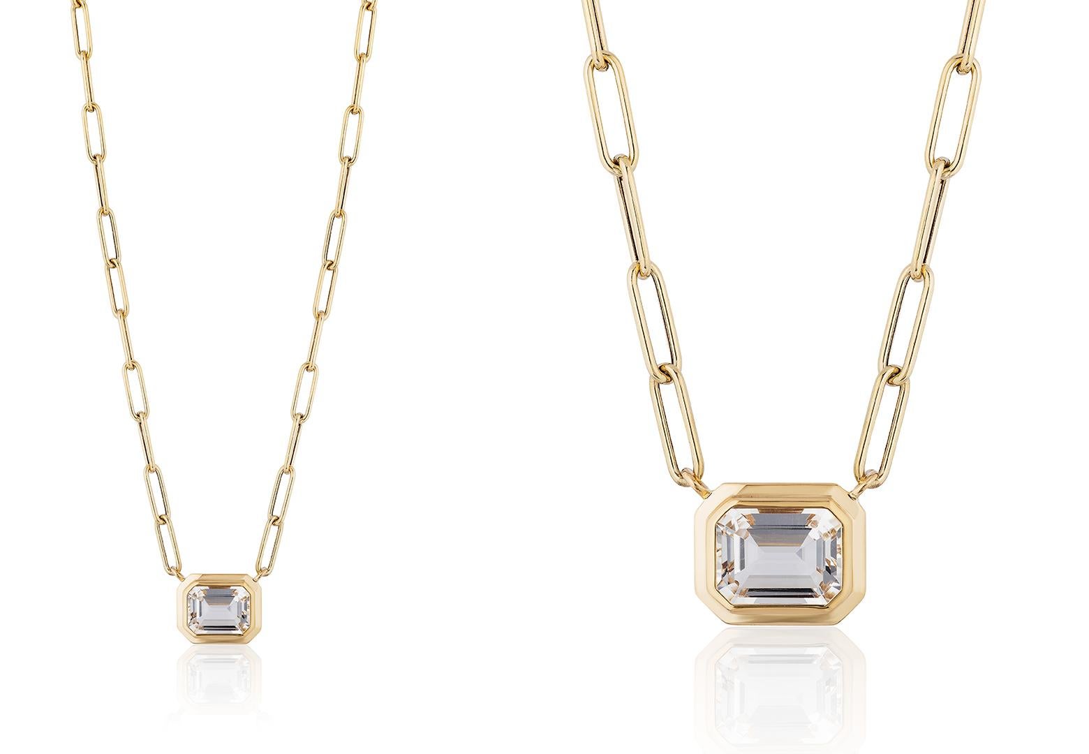 This beautiful East-West Rock Crystal Emerald Cut Bezel Set Pendant in 18K Yellow Gold is from our ‘Manhattan’ Collection. Minimalist lines yet bold structures are what our Manhattan Collection is all about. Our pieces represent the famous skyline