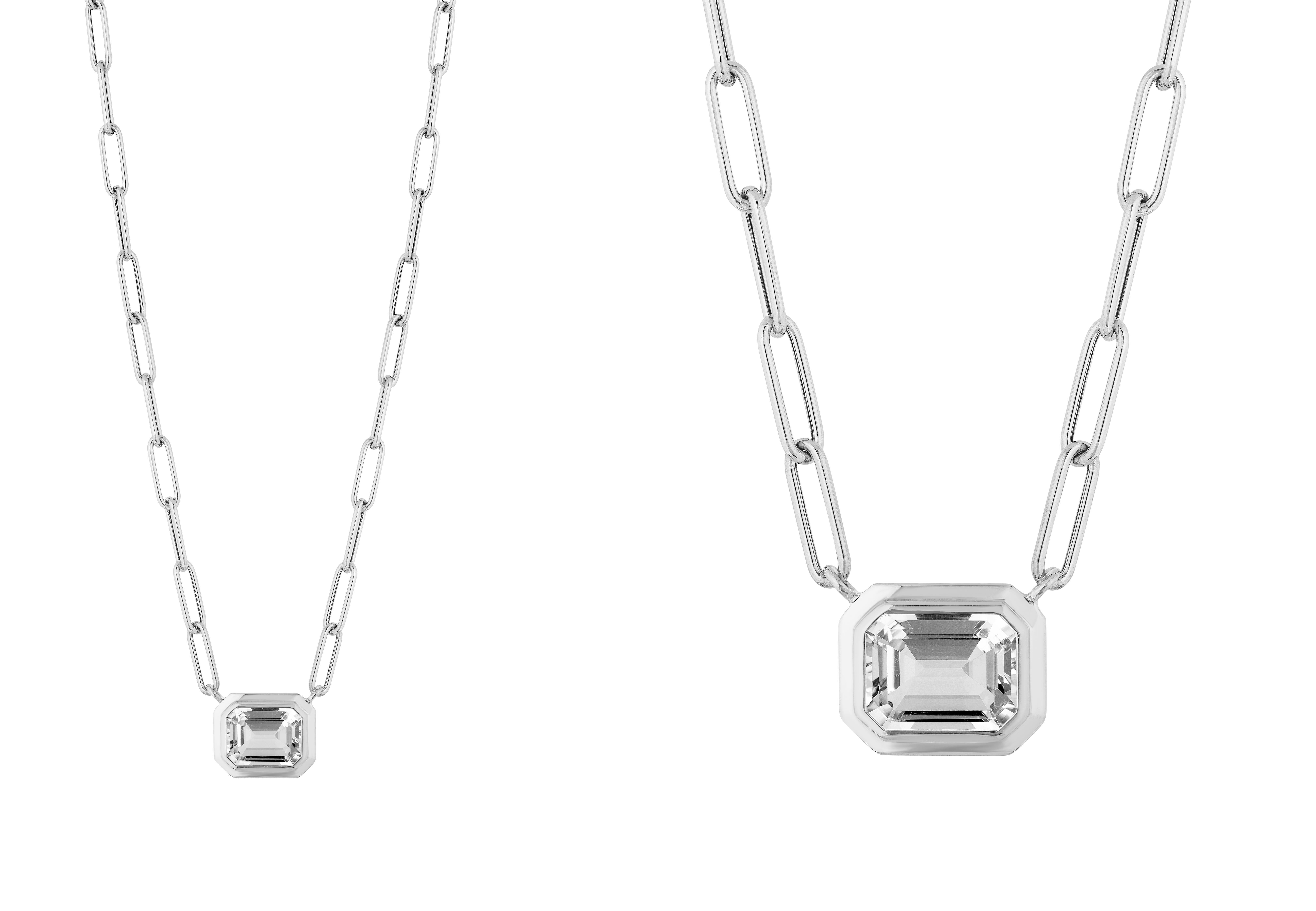 This beautiful East-West Rock Crystal Emerald Cut Bezel Set Pendant in 18K White Gold is from our ‘Manhattan’ Collection. Minimalist lines yet bold structures are what our Manhattan Collection is all about. Our pieces represent the famous skyline