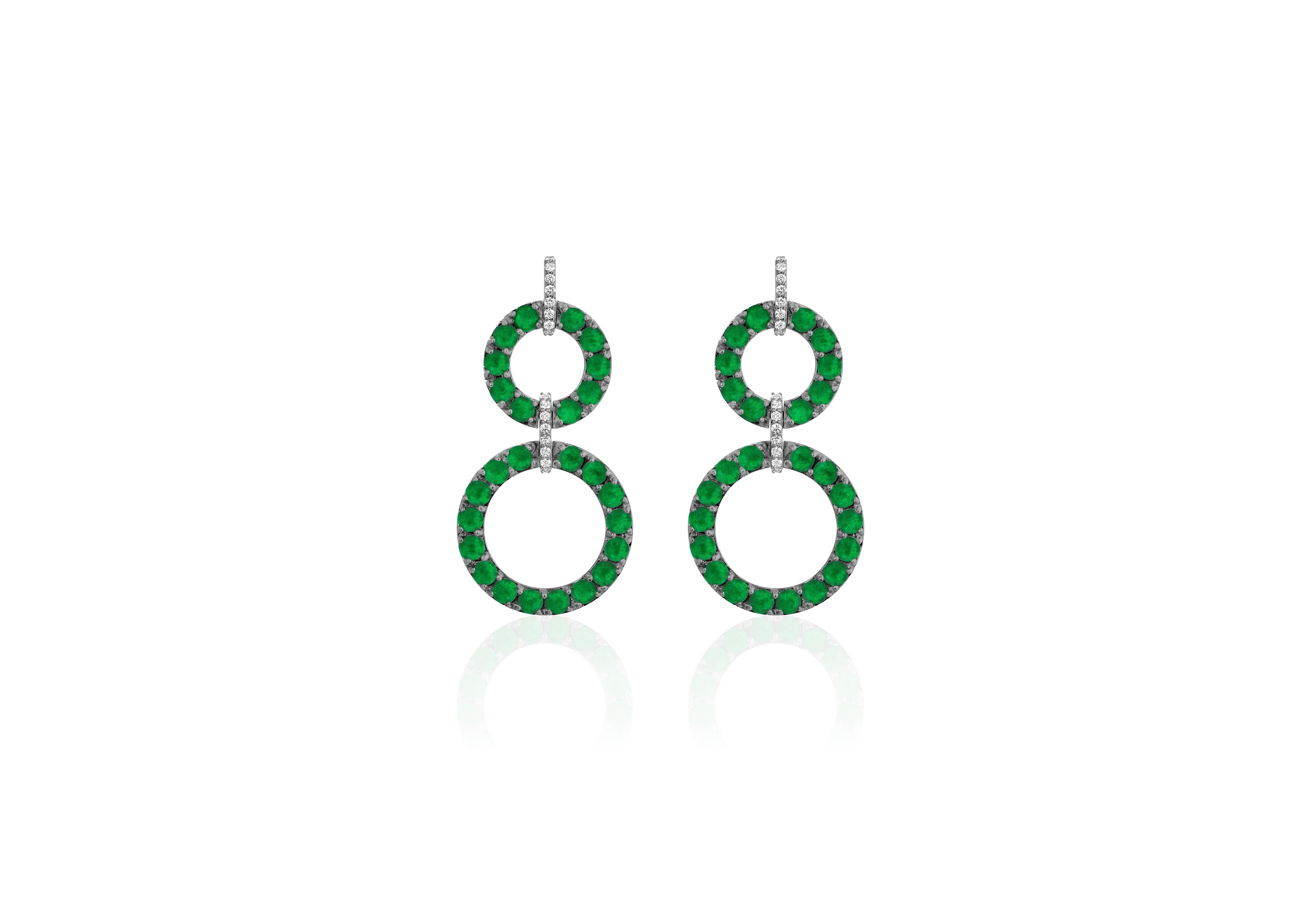 ‘Limited-Edition’ Emerald Cabochon 2 Row Earrings With Diamonds in 18K White Gold. The Emeralds makes these earrings very special, and a great piece to have in your personal collection.

* Gemstone: 100% Earth Mined 
* Approx. gemstone Weight: 6.20