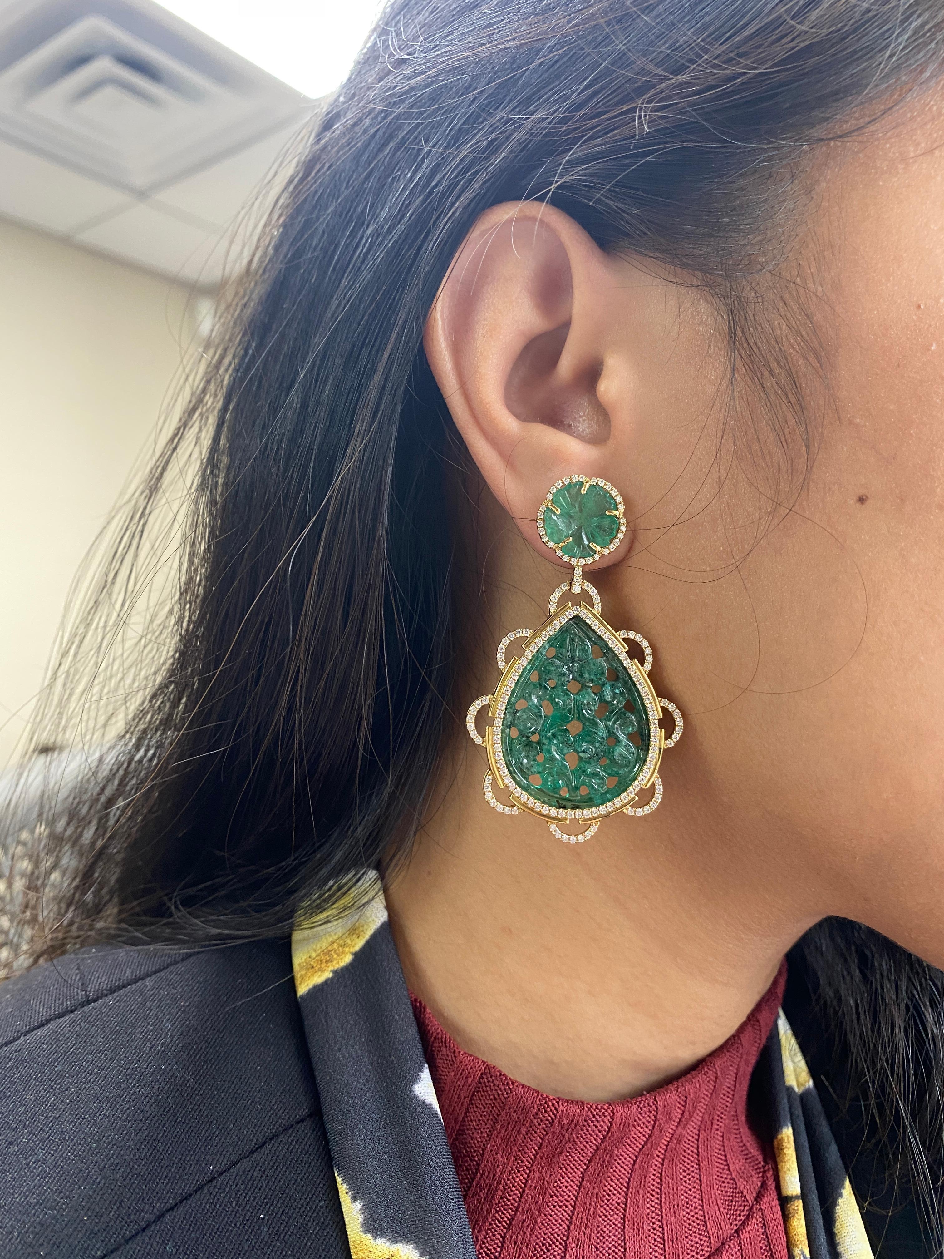 These one of a kind Emerald Carved with Carved Flower and Diamond Earrings are set in 18K Yellow Gold. They are part of our ‘G-One' Collection. If you want to make a statement, this is a perfect piece to do it!

Gemstone: 100% Earth Mined 
Approx.
