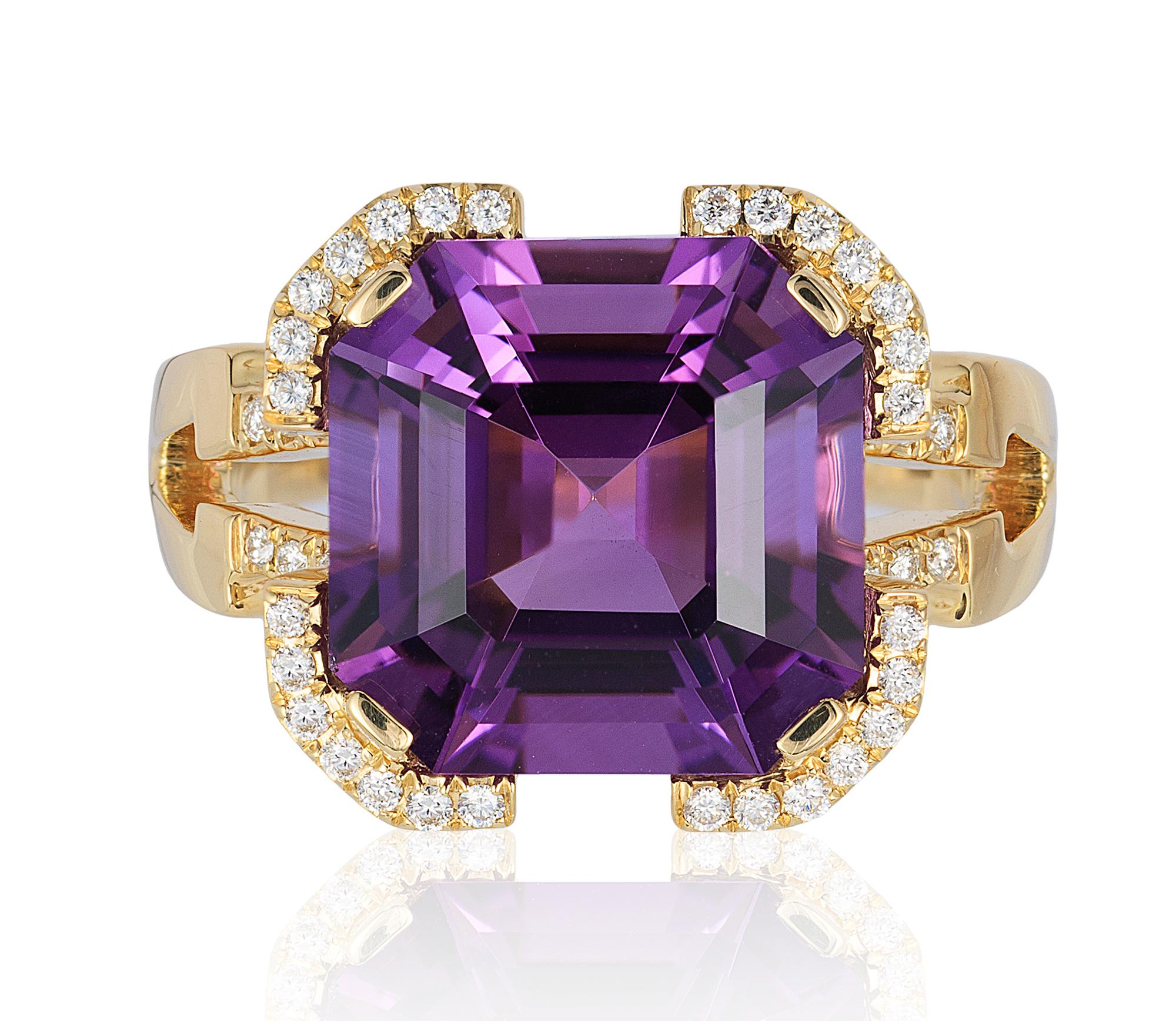 This Amethyst Emerald Cut Ring is a stunning piece of jewelry from the 'Gossip' Collection that features a beautiful purple amethyst gemstone cut in an emerald shape. The ring is made of 18K yellow gold, adding to its luxurious appeal, and is