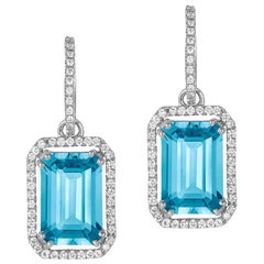 Boucles d'oreilles Goshwara en topaze bleue taille émeraude et diamants
