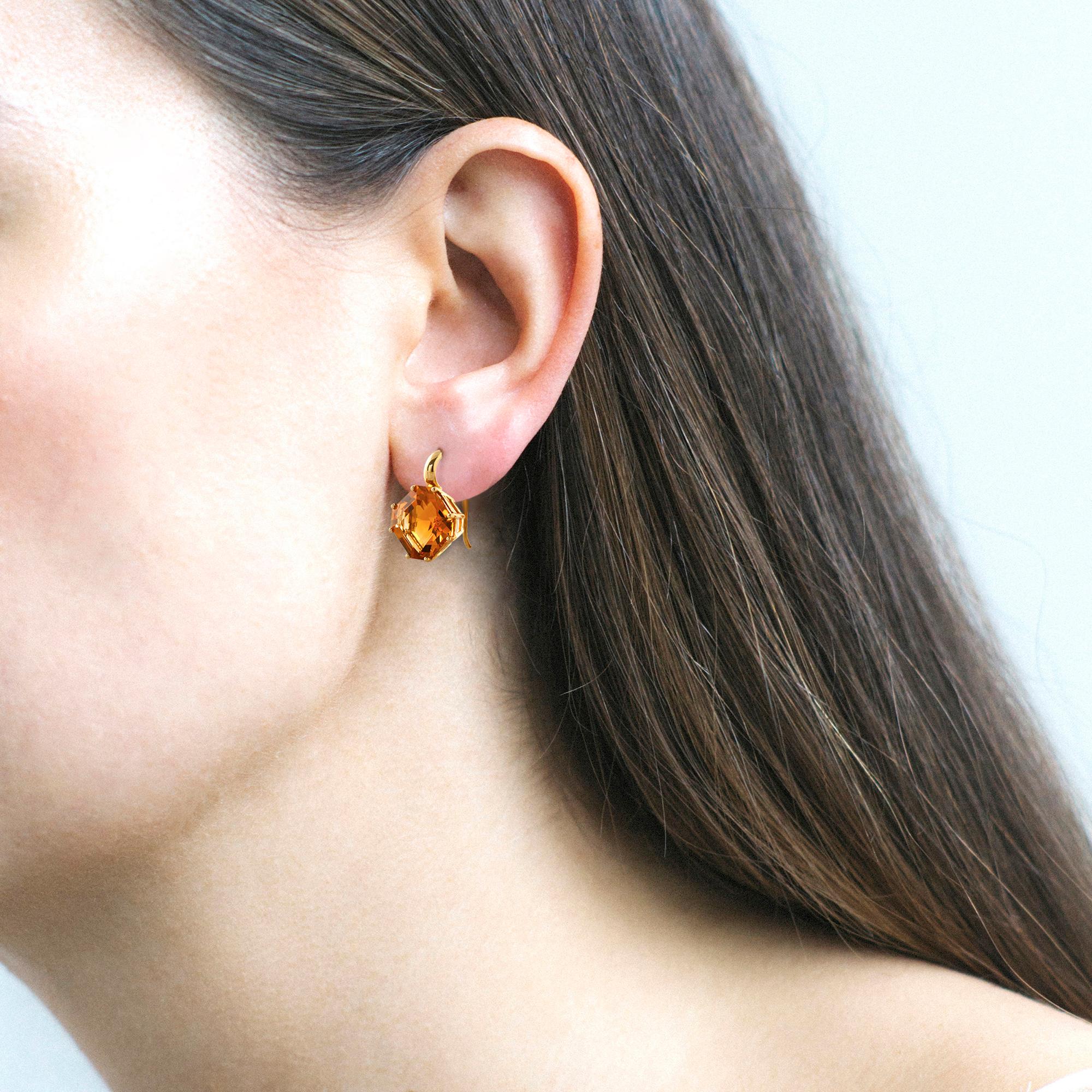 Elevate your elegance with our Citrine Square Emerald Cut Earrings from the enchanting 'Gossip' Collection. Crafted in luxurious 18K Yellow Gold, these exquisite earrings feature dazzling citrine gemstones in a chic emerald cut, suspended delicately