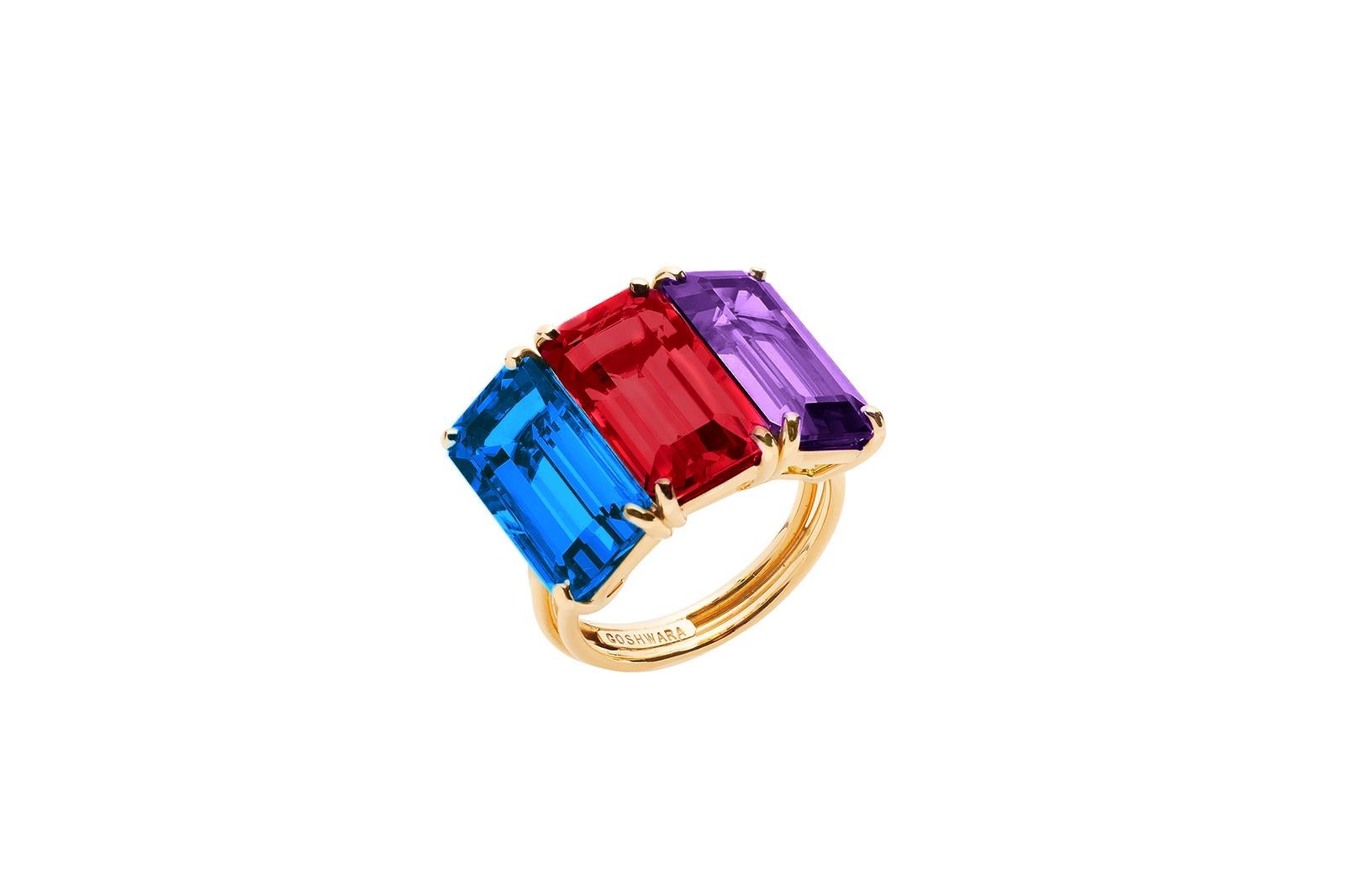 Three Stone Emerald Cut, Amethyst, Garnet and London Blue Topaz Ring in 18K Yellow Gold from 'Gossip' Collection

Stone Size: 13 x 7 mm

Gemstone Approx. Wt: Amethyst- 3.55 Carats 
                                       Garnet- 5.40 Carats 
        