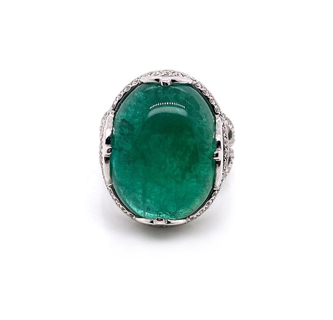 'G-One' Emerald Oval Cabochon Ring in 18K White Gold with Diamonds  

Stone size:  16 x 14 mm 

Approx. gemstone Wt: 18.52 Carats (Emerald)

Diamonds: G-H / VS, Approx. Wt: 0.90 Carats